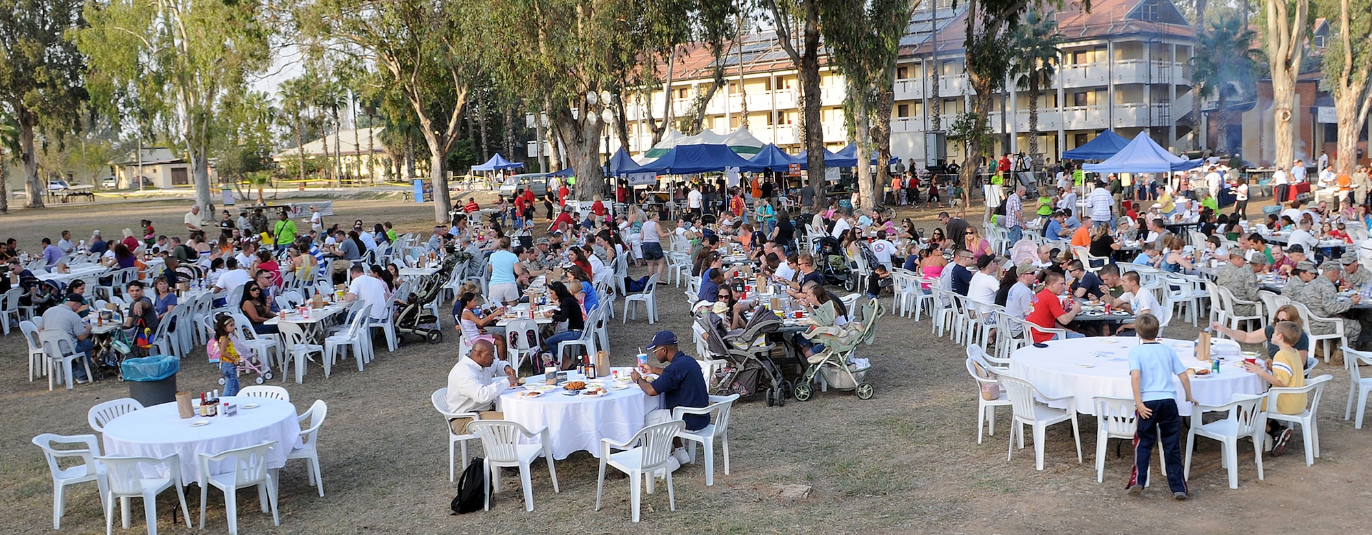 Several hundred Incirlik members partake in celebrating the Fall Festival Friday, Oct. 23, 2009, at Incirlik Air Base, Turkey. OSI Restaurant Partners, the mother company of Outback Steakhouse, Carrabba’s Italian Grill, Bonefish Grill, Flemings Prime Steakhouse & Wine Bar and Roy's Hawaiian Fusion Cuisine, wrapped up its Feeding Freedom Tour here. OSI’s team of 29 volunteers visited several American bases in the Middle East, serving food from their restaurants to deployed troops. About 3,500 Incirlik members were served food. (U.S. Air Force photo/Senior Airman Alex Martinez)