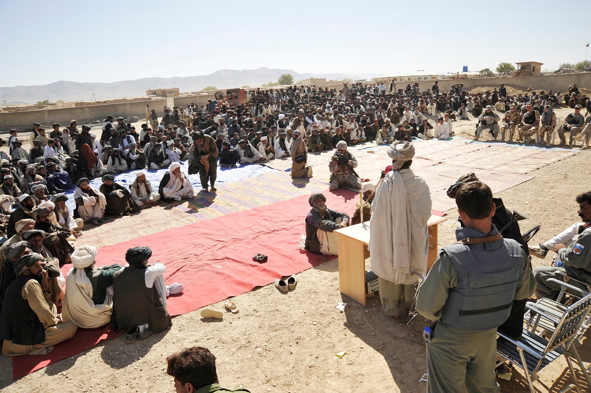 U.S. military members, civilian agencies, Afghan officials and the people of Zabul province attend the ground breaking ceremony for the first high school for females Oct. 22, 2009, at Shajoy, Afghanistan. (U.S. Air Force photo/Staff Sgt. Angelita Lawrence) 
