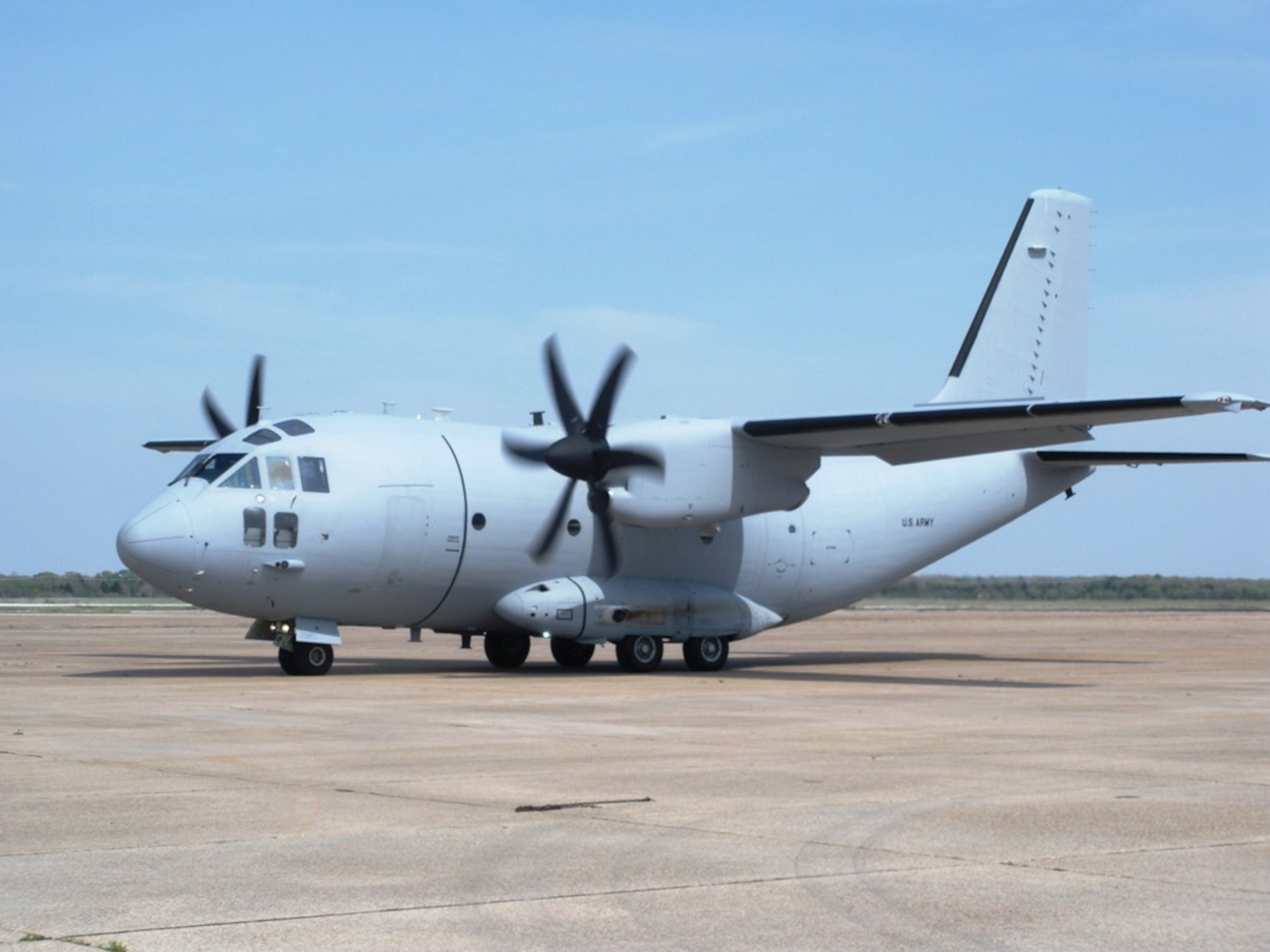 A C-27J Spartan taxis on the ramp at Redstone Arsenal, Ala., during flight testing in early 2009.  In April, through Resource Management Decision 802, Defense Secretary Robert Gates moved the C-27J program and its related direct support mission from the Army to the Air Force.  (U.S. Air Force Photo) 