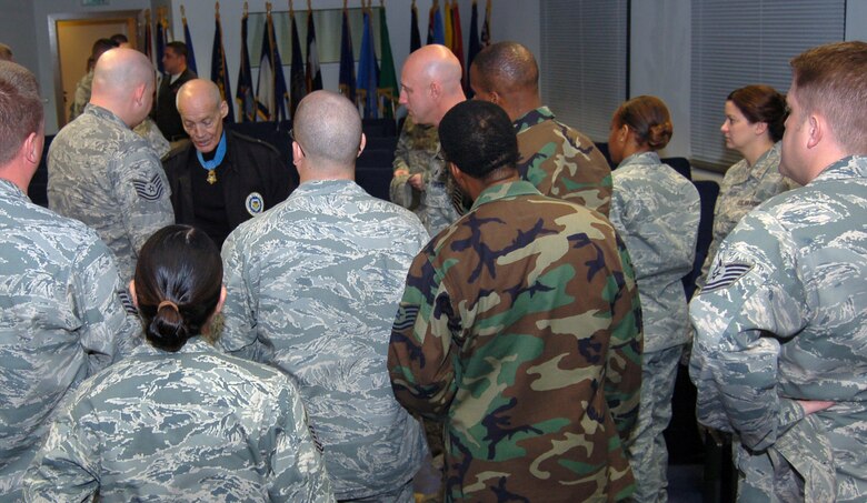Retired U.S. Army Col. Robert Howard, Medal of Honor recipient, swaps stories with members of the current Kisling Noncommissioned Officer Academy, Kapaun Air Station, Germany, Oct. 23, 2009. Sergeant Littrell spoke to the class about leadership and commitment to service during a question and answer forum at the academy. (U.S. Air Force photo by Senior Airman Amanda Dick)