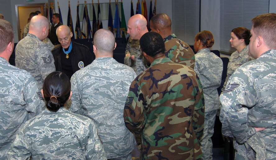 Retired U.S. Army Col. Robert Howard, Medal of Honor recipient, swaps stories with members of the current Kisling Noncommissioned Officer Academy, Kapaun Air Station, Germany, Oct. 23, 2009. Sergeant Littrell spoke to the class about leadership and commitment to service during a question and answer forum at the academy. (U.S. Air Force photo by Senior Airman Amanda Dick)