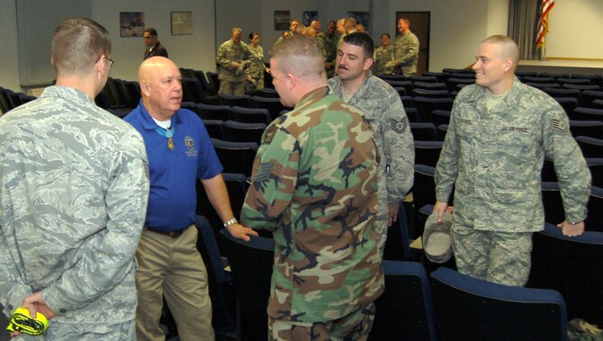 Retired U.S. Army Command Sgt. Maj. Gary Littrell, Medal of Honor recipient, swaps stories with members of the current Kisling Noncommissioned Officer Academy, Kapaun Air Station, Germany, Oct. 23, 2009. Sergeant Littrell spoke to the class about being a responsible leader during a question and answer forum at the academy. (U.S. Air Force photo by Senior Airman Amanda Dick)