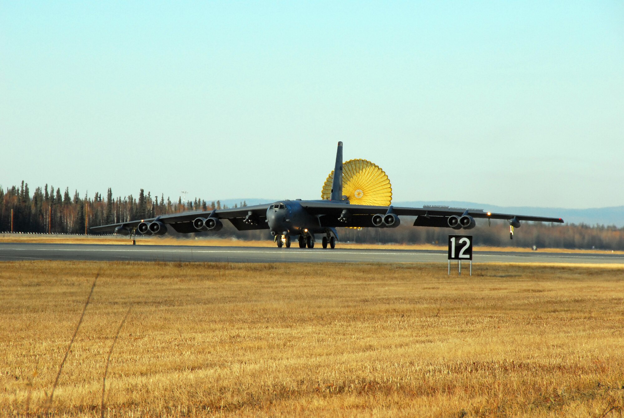 A B-52 Stratofortress deploys a parachute while landing after a RED FLAG-Alaska 10-1 training mission Oct. 15, 2009 Eielson Air Force Base, Alaska. The RF-A exercise provides unique opportunities to integrate various forces into joint, coalition and bilateral training from a simulated forward operating base.  The B-52 is assigned to the 23rd Bomber Squadron, Minot AFB, N.D. (U.S. Air Force photo/Tech. Sgt. Shad Eidson)
