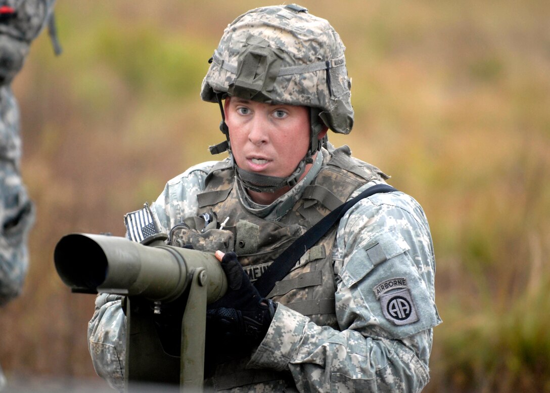 U.S. Army Staff Sgt. Eric Meinhardt calls out measurements to prepare a howitzer for the appropriate position for firing during a training exercise on Fort Bragg, N.C. Oct., 14, 2009. Meinhardt is a paratrooper assigned to the 82nd Airborne Division’s 2nd Battalion, 319th Airborne Field Artillery Regiment.