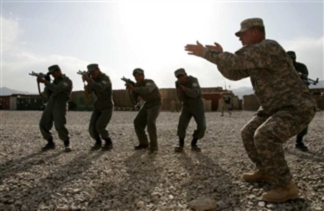 Afghan National Police officers participate in tactical movement training at Combat Outpost Herrera, Paktiya province, Afghanistan, on Oct. 20, 2009.  The training is conducted by U.S. Army soldiers with the 92nd Military Police Company, Baumholder, Germany.  