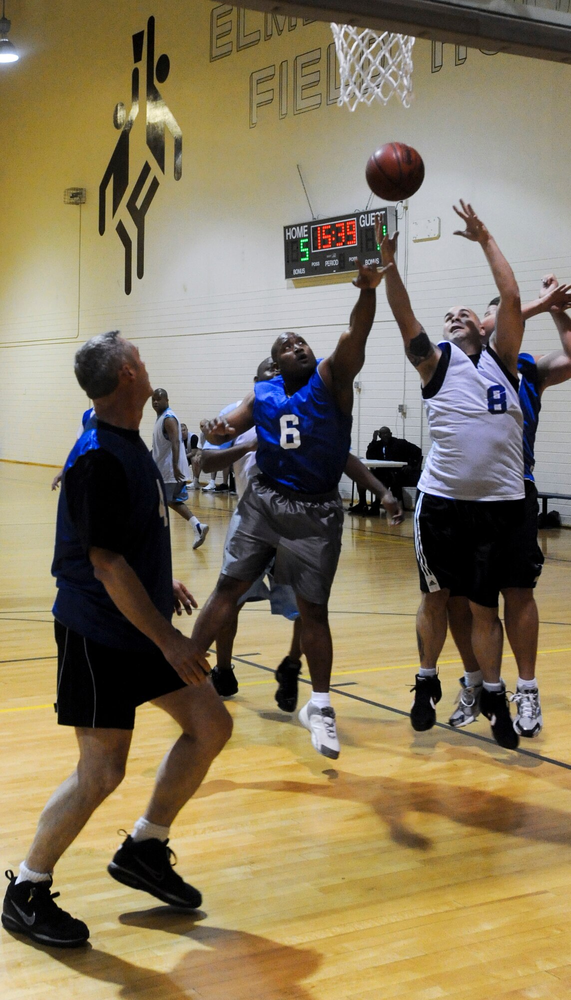ELMENDORF AIR FORCE BASE, Alaska -- Players from the 3rd Equipment Maintenance Squadron and the 3rd Force Support Squadron go up for a rebound in their game Oct. 26. The 3rd EMS won the match with a score of 49-47. (U.S. Air Force photo/ Airman Jack Sanders)