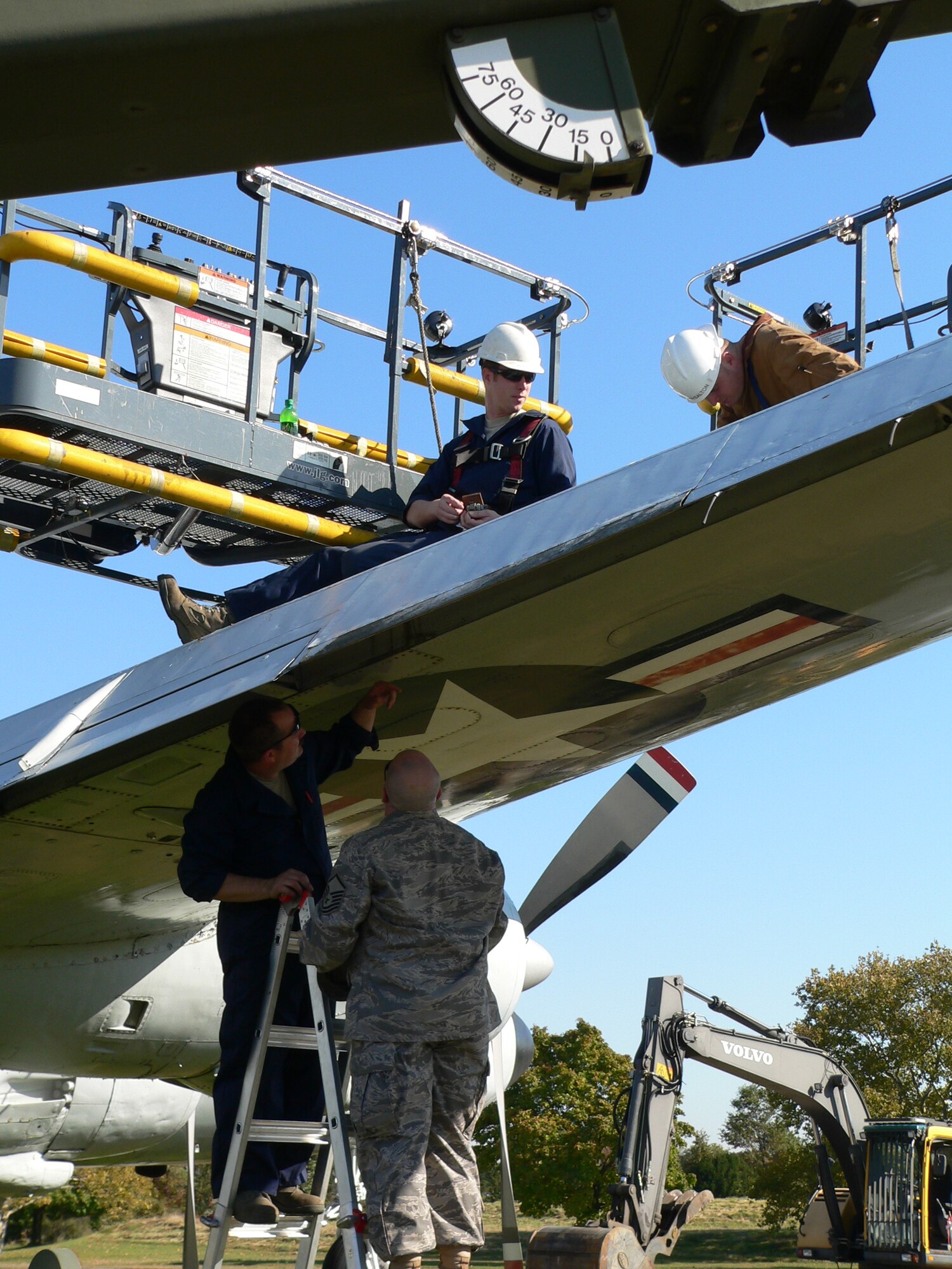 Members of the 305th and 514th maintenance groups are conducting the initial stages of the the C-118 Liftmaster restoration here. Senior Master Sgt. Christopher Hofrichter, project officer for the restoration, and his staff accomplished the first of several phases Oct. 20-23: the dismantling of the wings and cutting of the main landing gear mounts. (U.S. Air Force photo/Steve Snyder). 