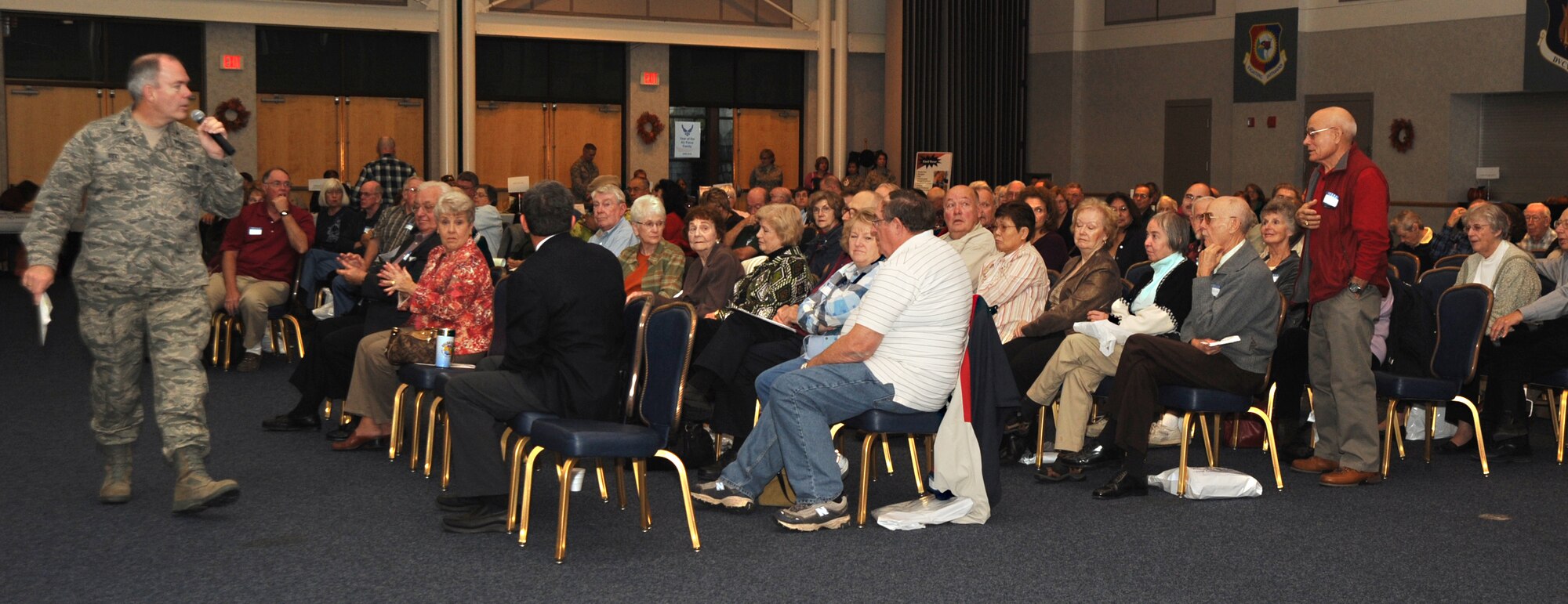 Col. Alan Reid, 22nd Medical Group commander, talks with audience members during a question and answer session, Oct. 24, 2009, at Retiree Appreciation Day at McConnell Air Force Base, Kan. (U.S. Air Force Photo/Airman 1st Class Ruiz)
