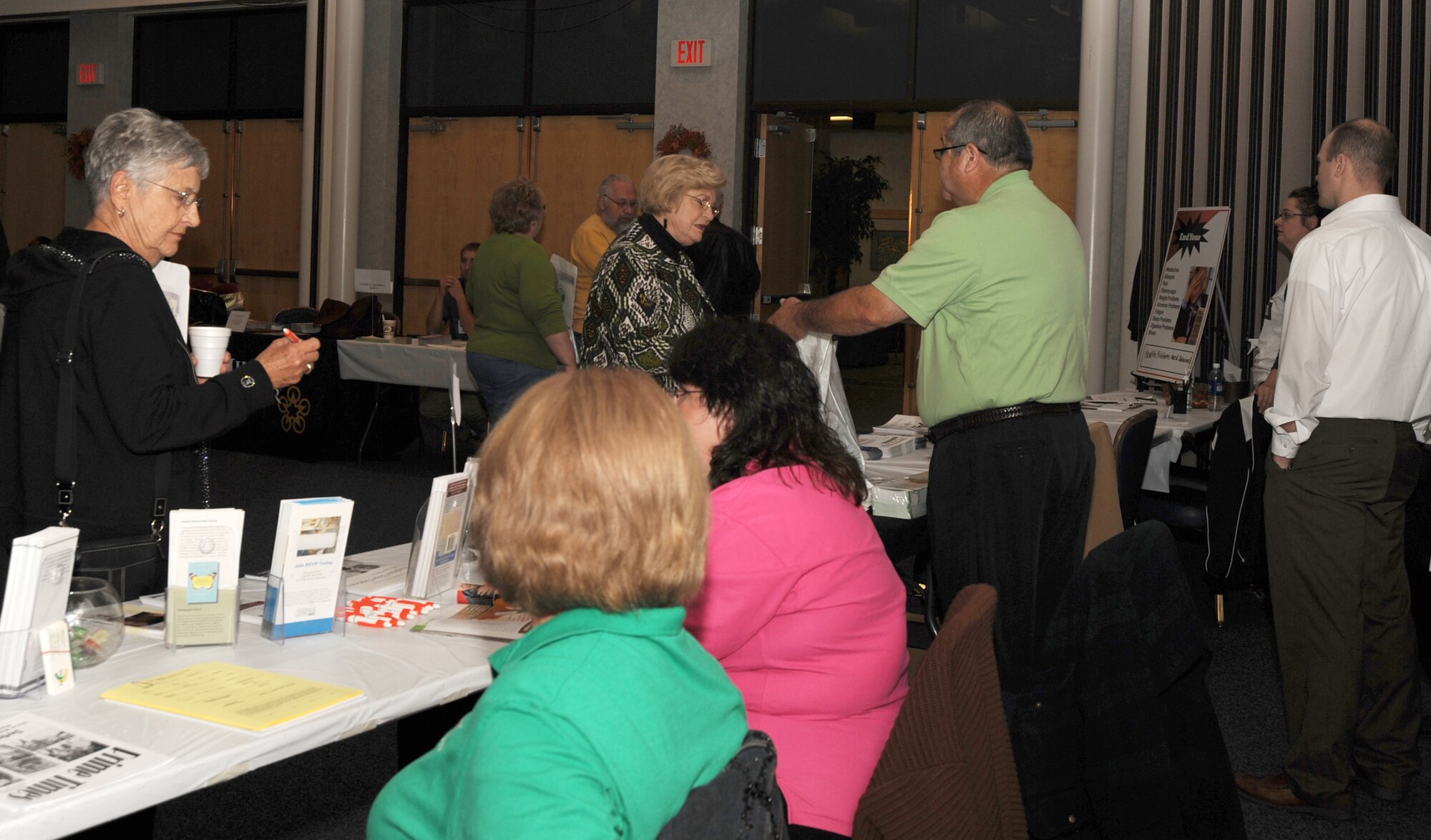 Representatives from various organizations provide information about their services to retirees and their spouses, Oct. 24, 2009, during Retiree Appreciation Day at McConnell Air Force Base, Kan. People from the retiree activities office, Air Force Sergeants Association, commissary and Airmen and Family Readiness Center and other organizations had display tables at the event. (U.S. Air Force Photo/Airman 1st Class Ruiz)