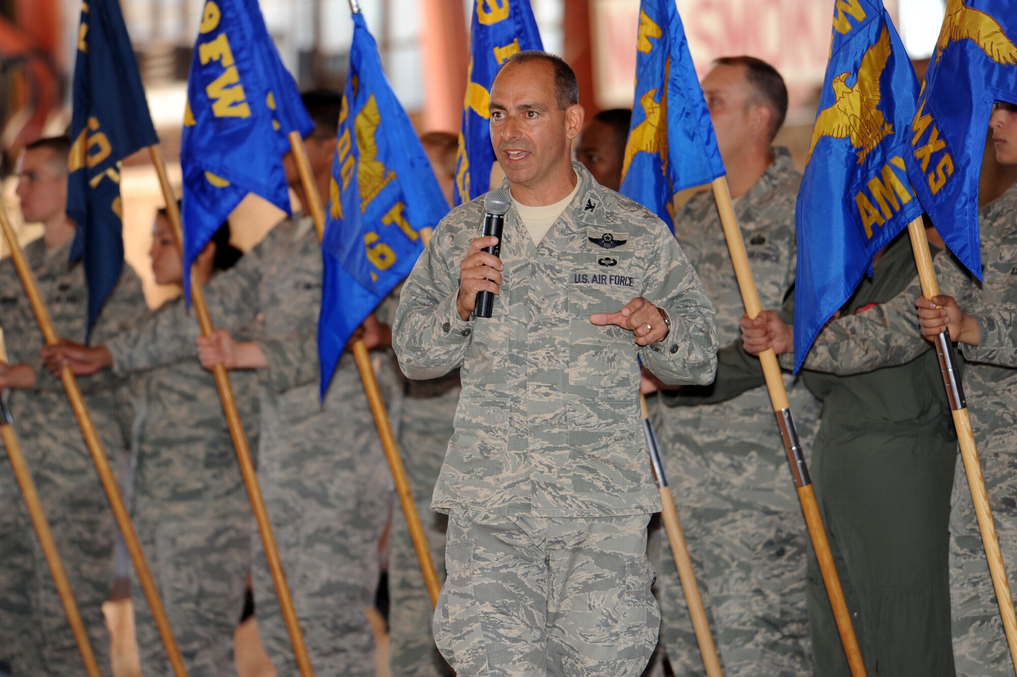 HOLLOMAN AIR FORCE BASE, N.M. -- Col. Jeff Harrigian, 49th Fighter Wing commander, speaks during a 49th FW Roll Call here Oct. 23. During his speech, Colonel Harrigian focused his outlook for the future of the wing on teamwork. He challenged every Airman to get to know one another, each other's jobs and how they all play a vital role to Holloman's mission. (U.S. Air Force photo by Senior Airman Michael Means)