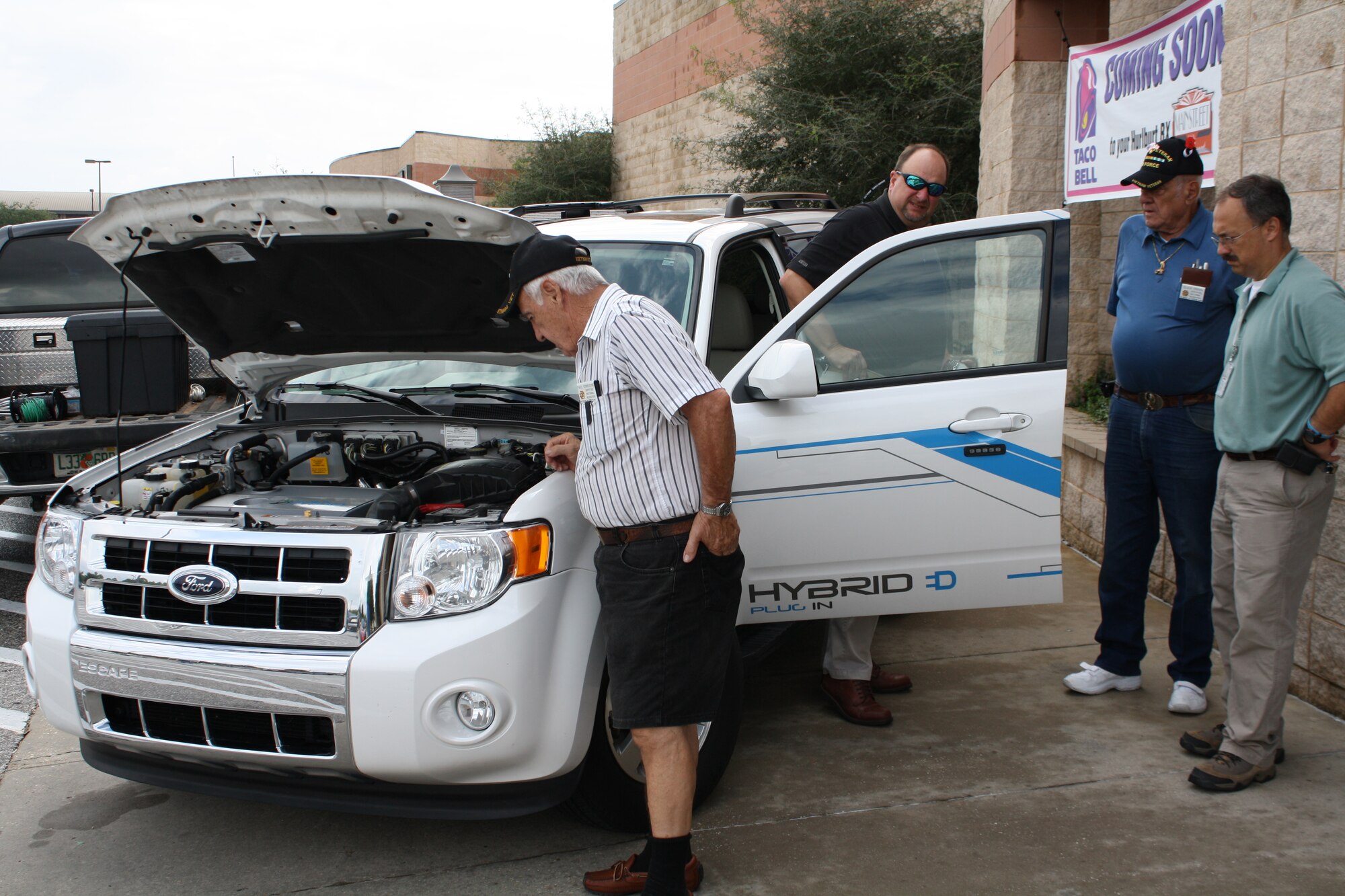 The Ford Escape plug-in hybrid electric vehicle (PHEV), capable of obtaining
an estimated 60 miles per gallon, sits on display at an energy event at the
Hurlburt Field Base Exchange Oct. 15. The 1st Special Operations Civil Engineer
Squadron, in cooperation with Gulf Power, sponsored an event at the Base
Exchange that highlighted innovations in energy conservation. (photo
courtesy of Marc Barrett)
