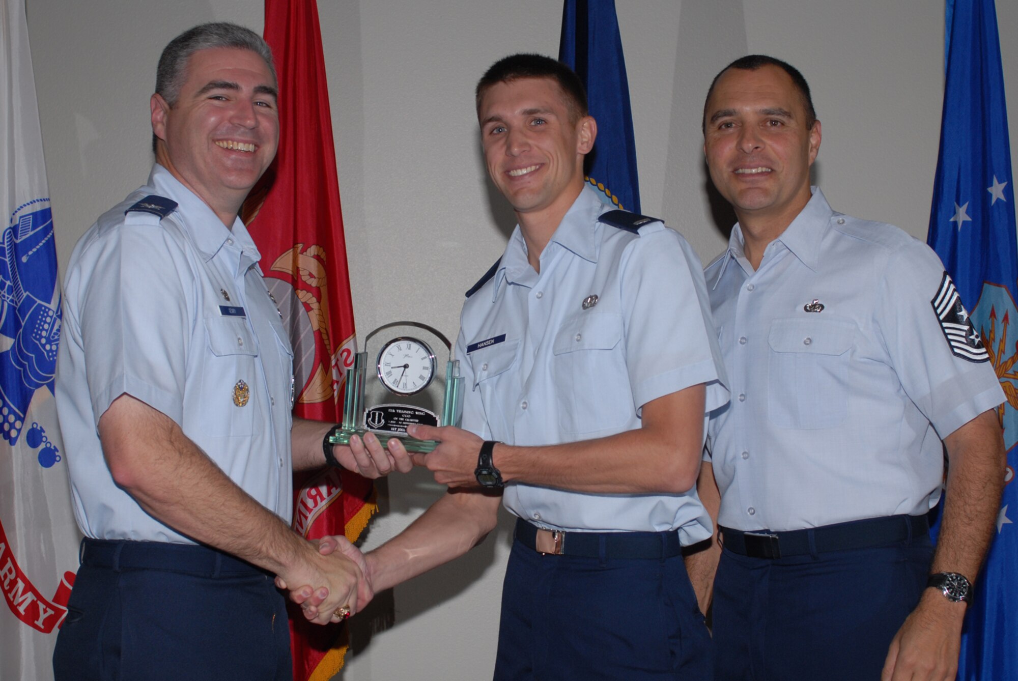 GOODFELLOW AIR FORCE BASE, Texas -- 1st Lt. Joel Hansen, 17th Mission Support Group, receives 17th Training Wing CGO of the Quarter during the wing quarterly award ceremony, Oct. 26, 2009. (U.S. Air Force photo/Staff Sgt. Laura R. McFarlane)
