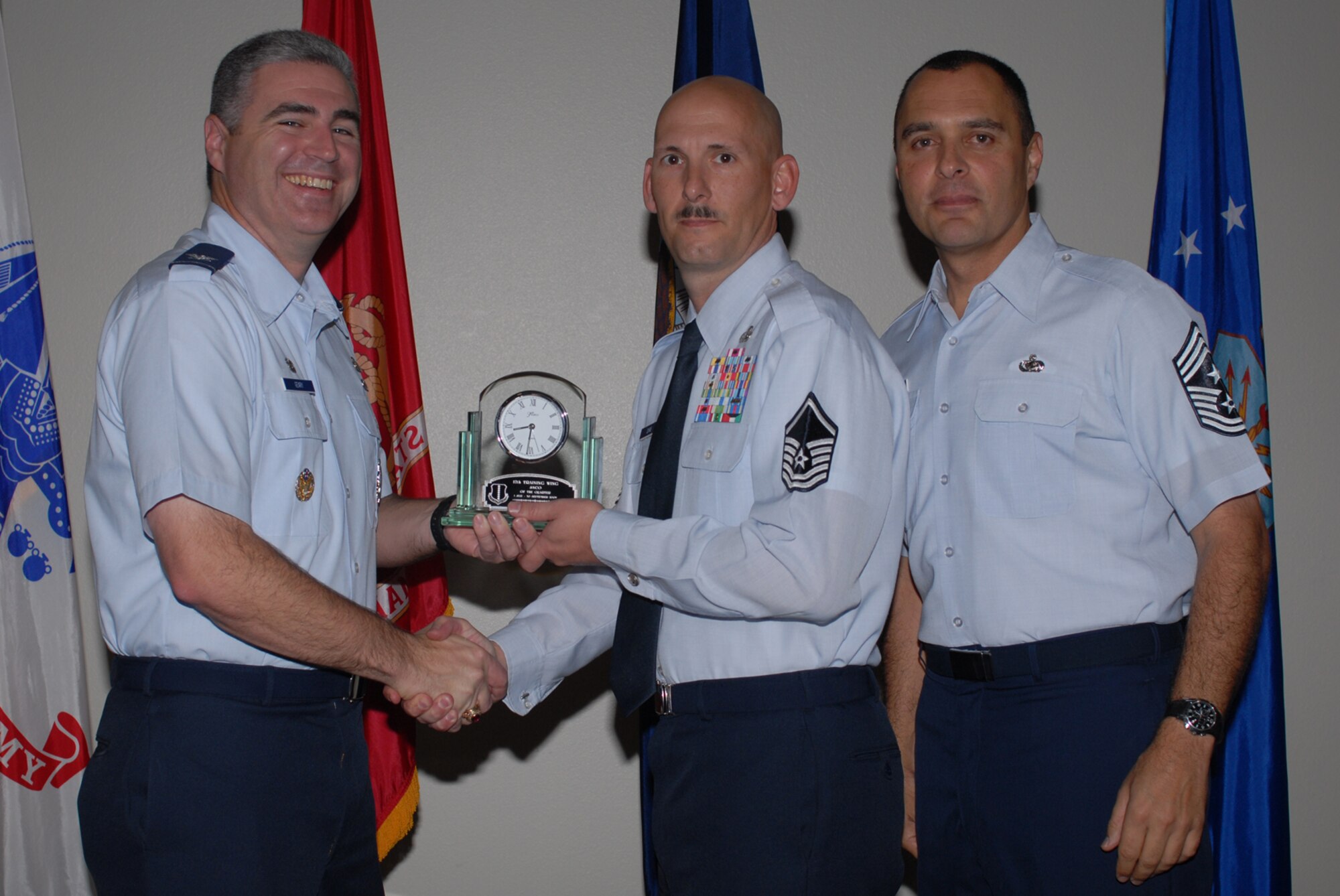 GOODFELLOW AIR FORCE BASE, Texas -- Master Sgt. Jerry Dire, 17th Mission Support Group, receives 17th Training Wing Senior NCO of the Quarter during the wing quarterly award ceremony, Oct. 26, 2009. (U.S. Air Force photo/Staff Sgt. Laura R. McFarlane)
