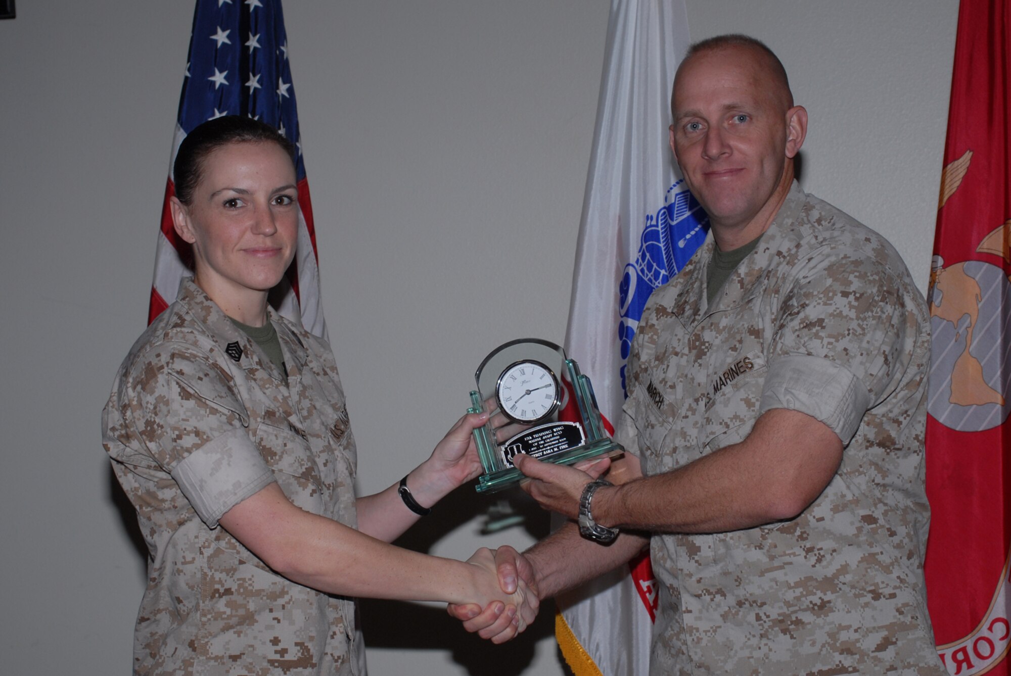 GOODFELLOW AIR FORCE BASE, Texas -- Marine Gunnery Sgt. Sara Fine, Marine Corps Detachment, receives 17th Training Wing Marine Staff NCO of the Quarter during the wing quarterly award ceremony, Oct. 26, 2009. (U.S. Air Force photo/Staff Sgt. Laura R. McFarlane)
