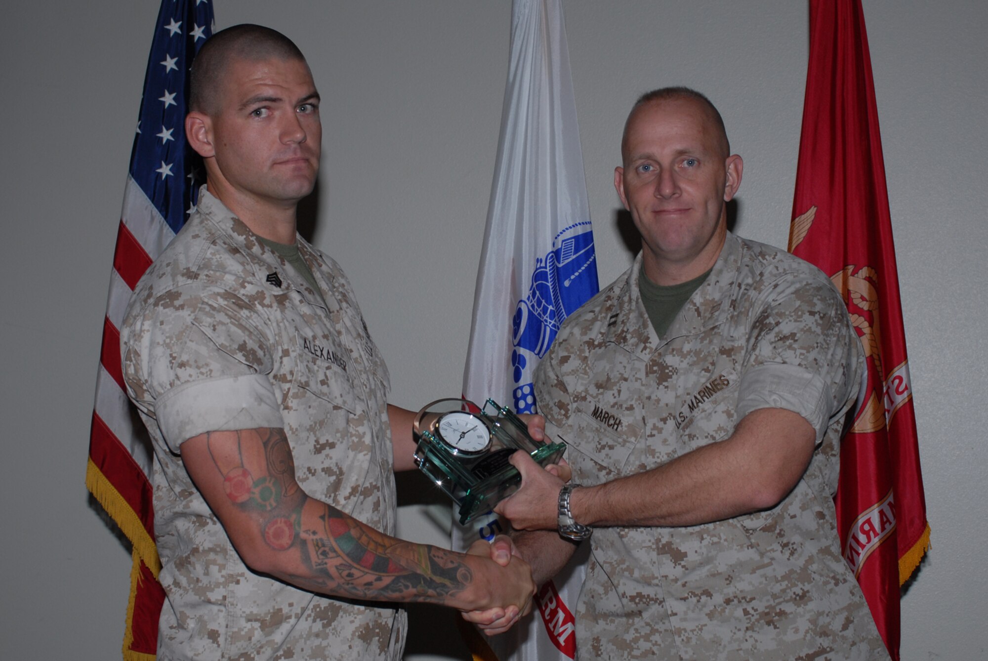 GOODFELLOW AIR FORCE BASE, Texas -- Marine Sgt. William Alexander, Marine Corps Detachment, receives 17th Training Wing Marine NCO of the Quarter during the wing quarterly award ceremony, Oct. 26, 2009. (U.S. Air Force photo/Staff Sgt. Laura R. McFarlane)
