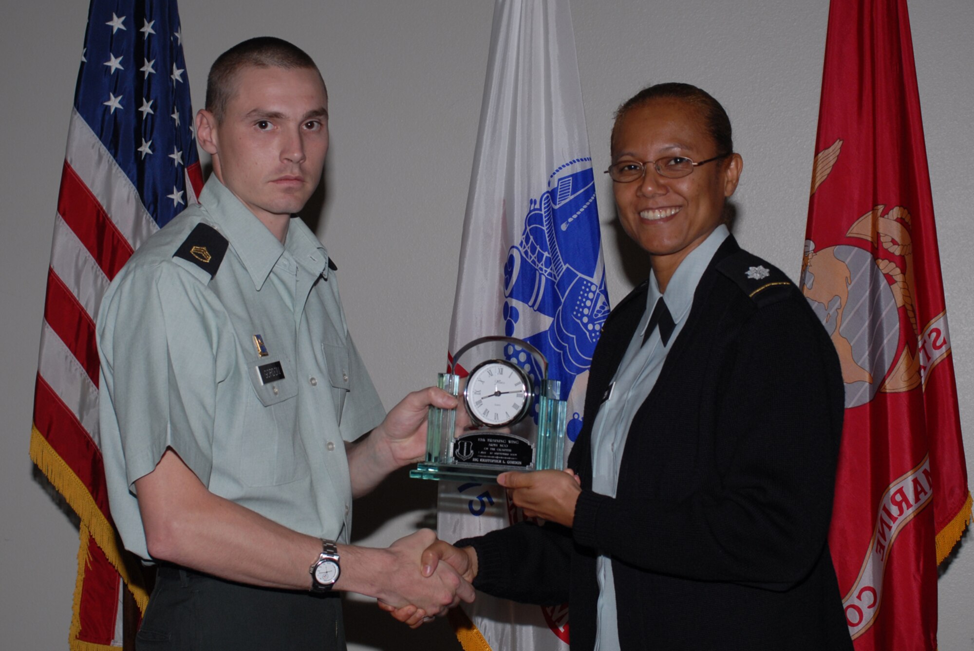 GOODFELLOW AIR FORCE BASE, Texas -- Army Staff Sgt. Kristopher Gordon, 344th Military Intelligence Battalion, receives 17th Training Wing Army NCO of the Quarter during the wing quarterly award ceremony, Oct. 26, 2009. (U.S. Air Force photo/Staff Sgt. Laura R. McFarlane)
