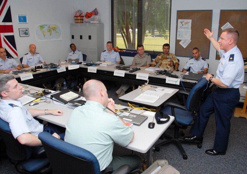 Students at the Carl A. Spaatz Center for Officer Education's Air Command and Staff College participate in a group discussion during class. ACSC is a 40-week course for majors and civilian equivalents and emphasizes critical thinking and effective communication. (U.S. Air Force photo/Bennett Rock)