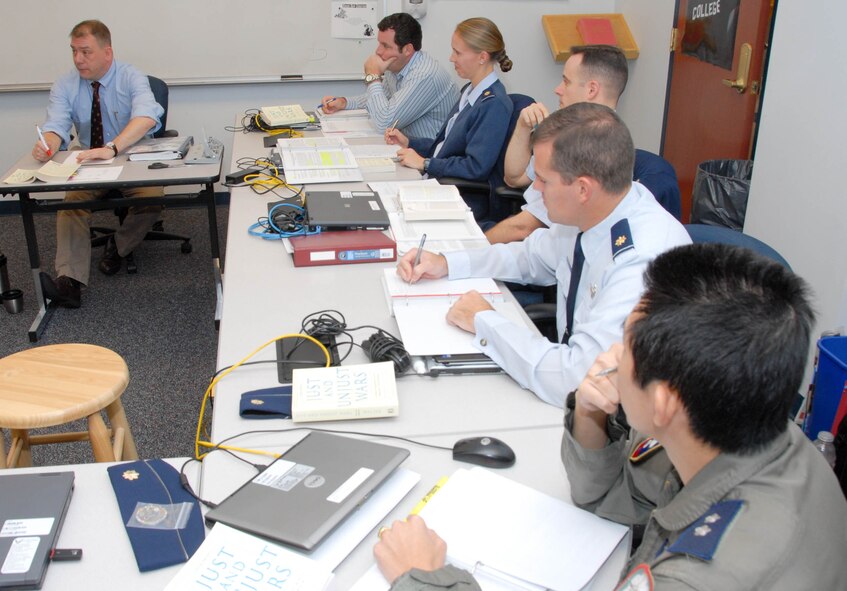Students at the Carl A. Spaatz Center for Officer Education's Air Command and Staff College participate in a group discussion during class. ACSC is a 40-week course for majors and civilian equivalents and emphasizes critical thinking and effective communication. (U.S. Air Force photo/Bennett Rock)