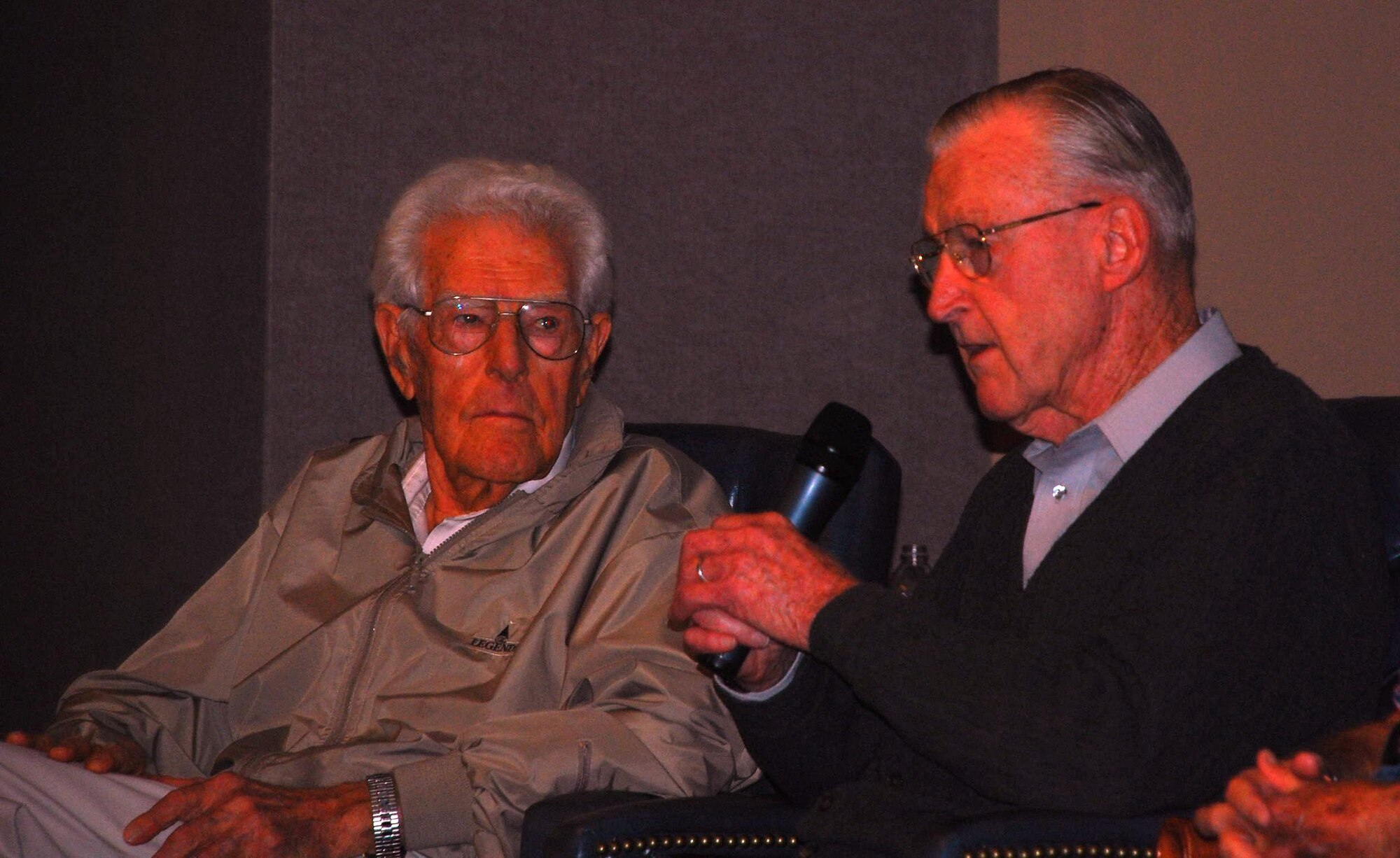 LAUGHLIN AIR FORCE BASE, Texas – Retired Colonels Arthur Jefferies and Albert Tucker debate which WWII era fighter aircraft, the P-38 Lightning or the P-51 Mustang, they preferred during a veterans’ panel at Anderson Hall here Oct. 22. The former Air Force fighter pilots were at Laughlin celebrating the reunion of the highly-decorated 434th Fighter Squadron. (U.S. Air Force photo by Airman 1st Class Blake Mize)