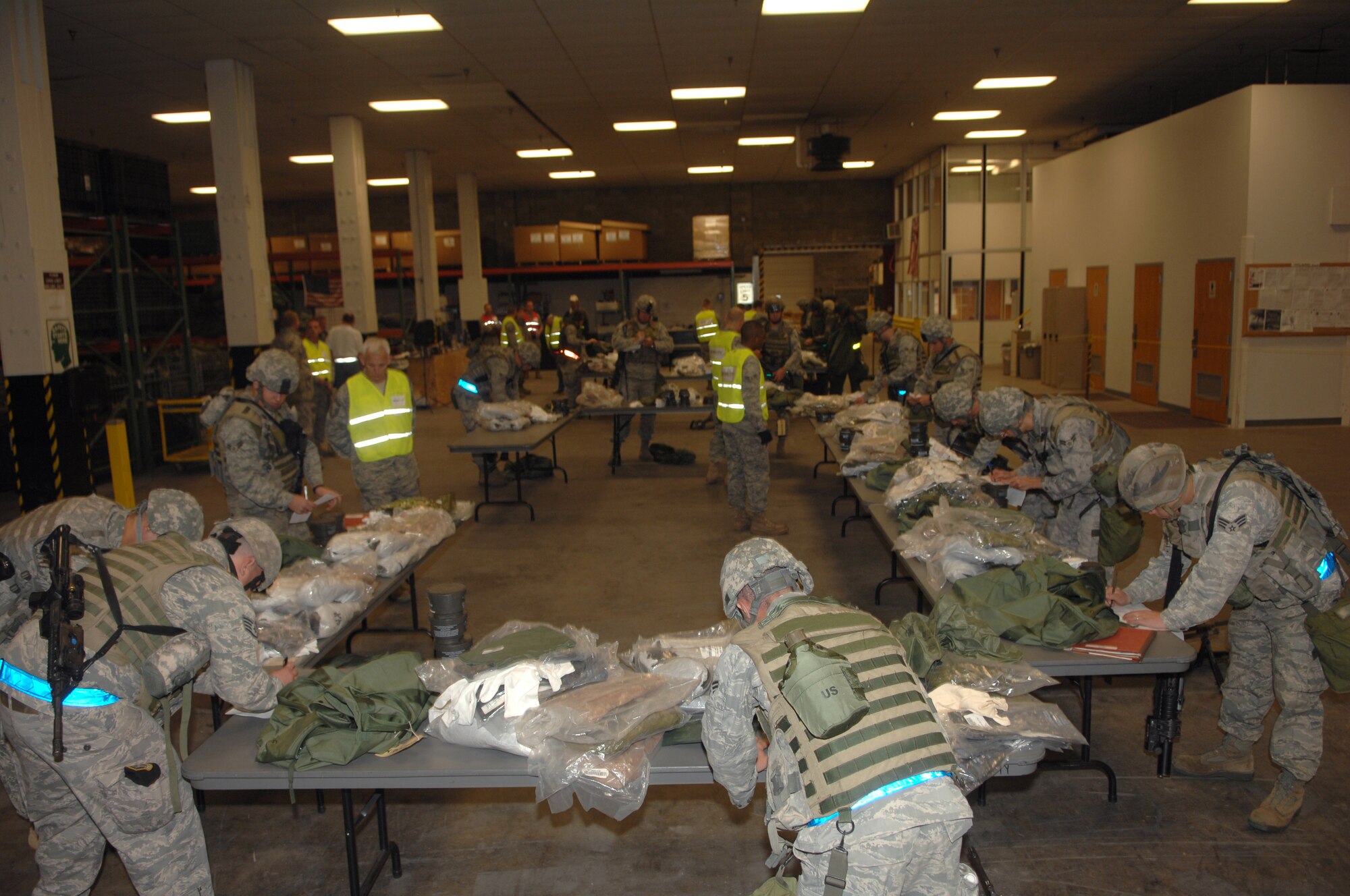 WHITEMAN AIR FORCE BASE, Mo. – Whiteman members take inventory of their mobility bags during the base Nuclear Operational Readiness Inspection Oct. 16. The NORI is a higher-headquarters inspection used to evaluate the 509th Bomb Wing's capability to conduct nuclear operations. (U.S. Air Force photo/Senior Airman Jessica Snow)(Released) 