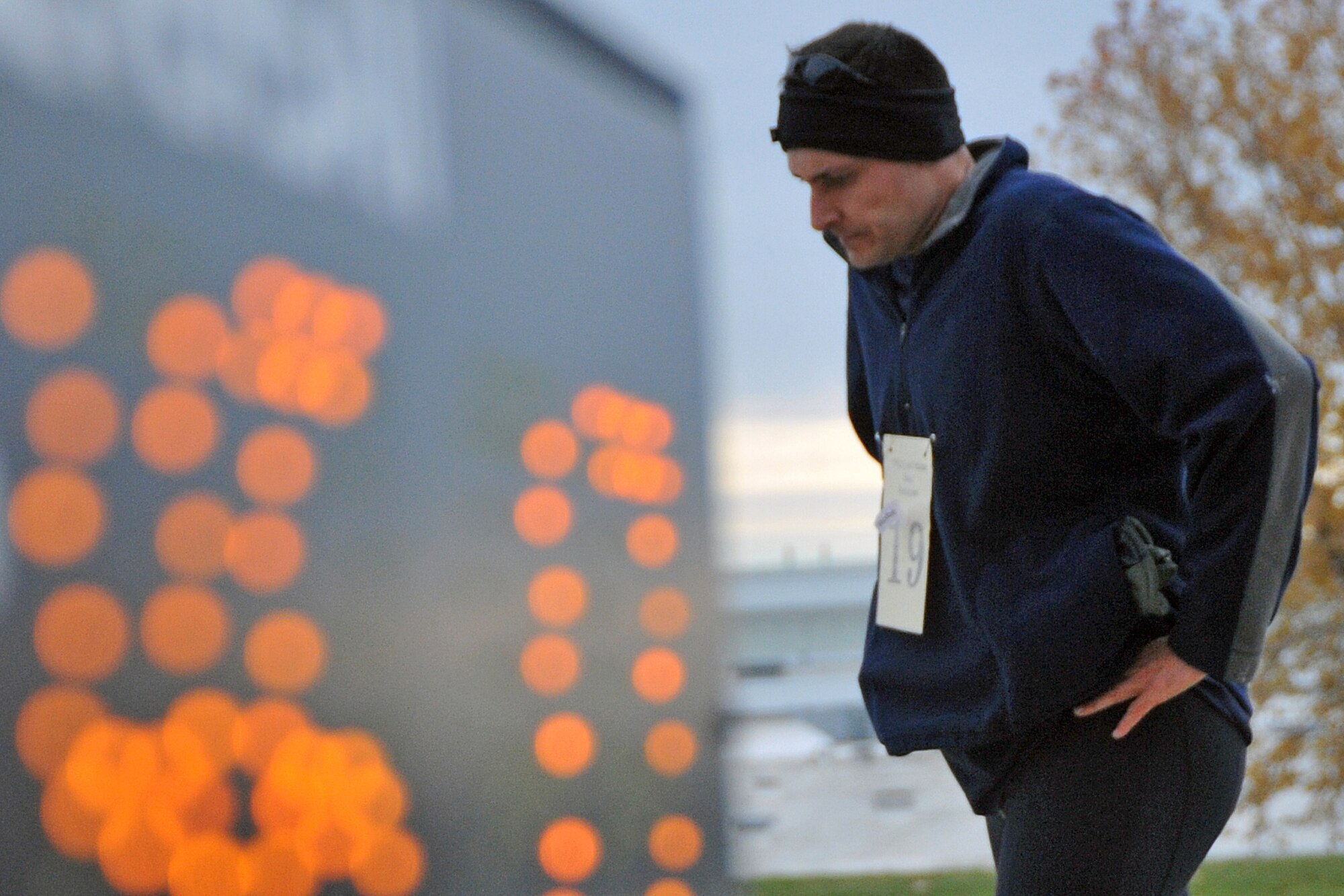 OFFUTT AIR FORCE BASE, Neb. - Maj. Robert Randall, a member of U.S. Strategic Command, catches his breath after finishing the Offutt Triathlon Oct. 24. During the event, athletes swam 400 yards, pedaled 12 miles on bicycles and ran 4 miles.  U.S. Air Force photo by Jeff W. Gates.