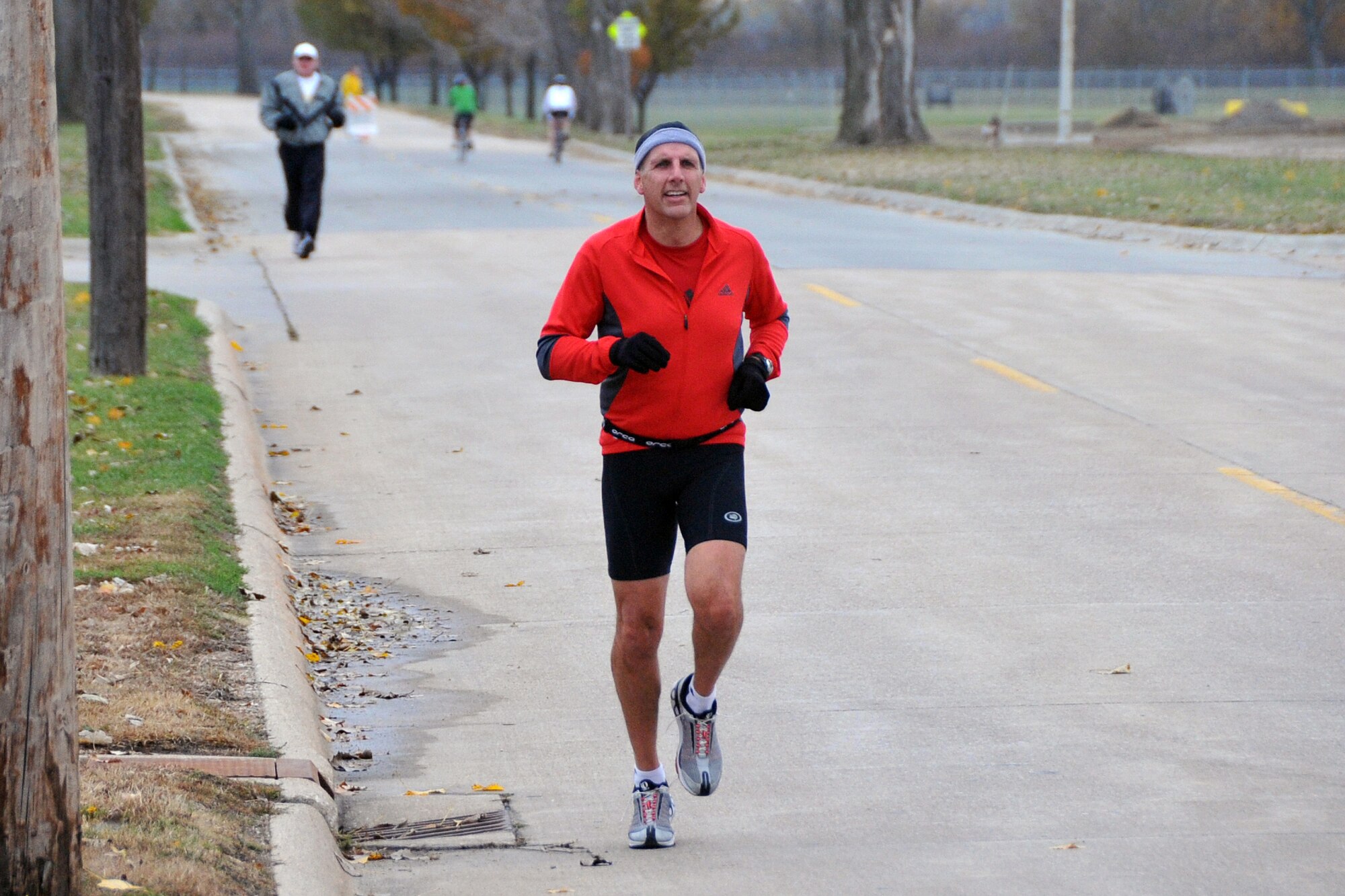 OFFUTT AIR FORCE BASE, Neb. - Todd Saylor, a U.S. Strategic Command civilian employee, picks up his pace for the running portion of the base Triathlon Oct. 24. During the event, athletes swam 400 yards, pedaled 12 miles on bicycles and ran 4 miles. U.S. Air Force photo by Jeff W. Gates.