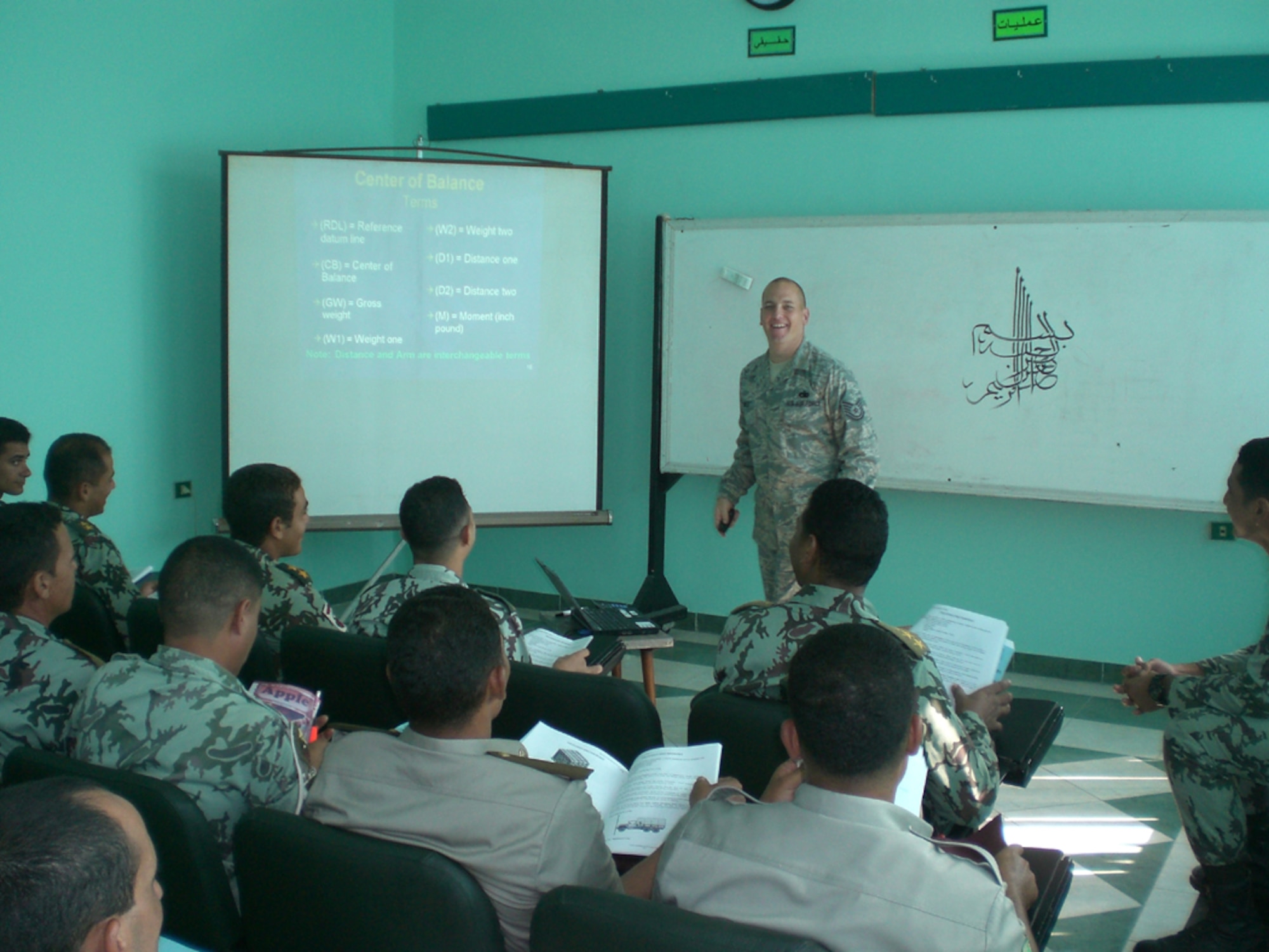 Tech. Sgt Jeff Fairlie conducts classroom instruction for Egyptian Airborne students during the BRIGHT STAR exercise in Cairo, Egypt, Oct. 9-21. The training course, which included five days of classroom instruction and three days of practical application, taught the basics of Air Force airlift operations and cargo loading procedures. (U.S. Air Force photo)