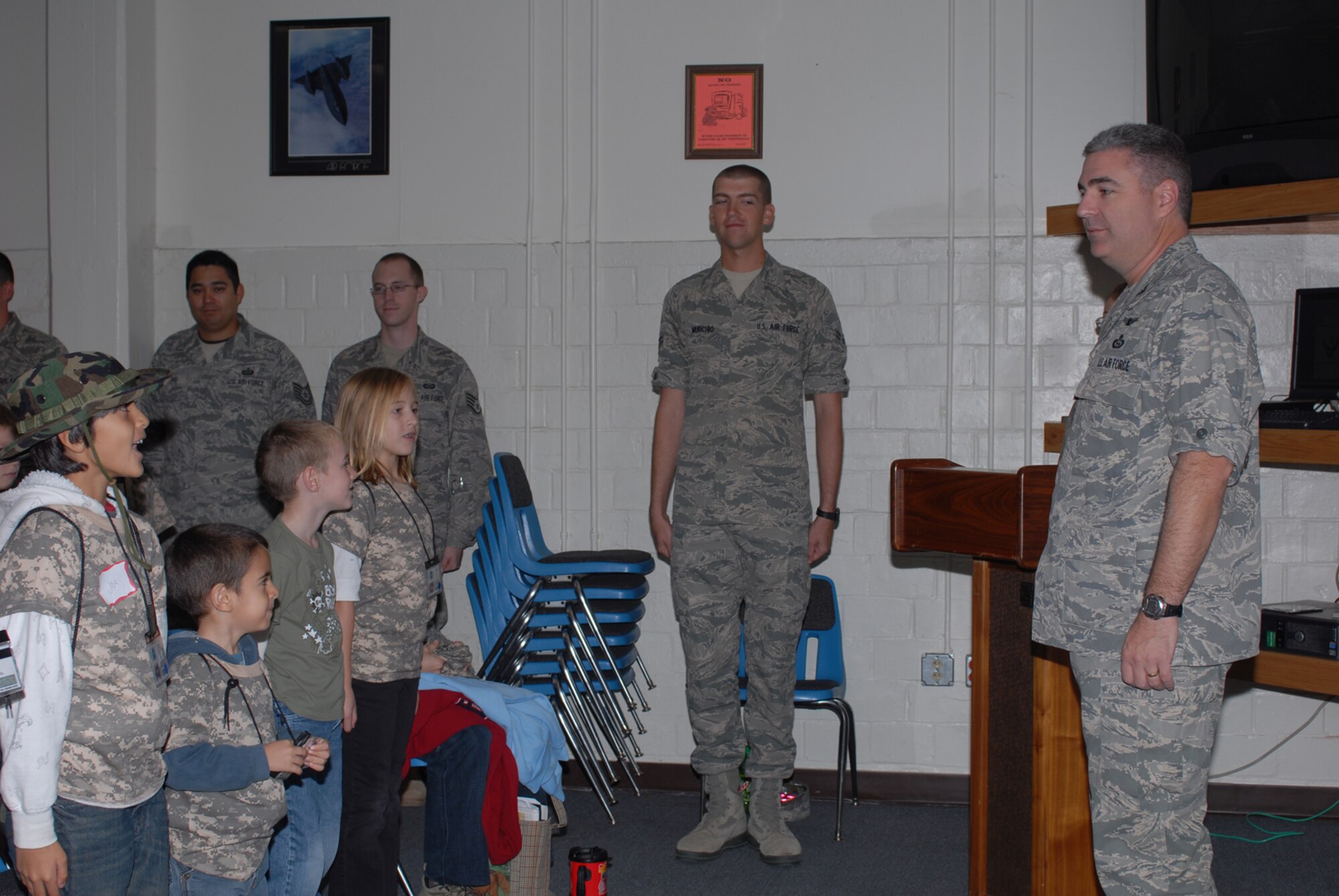GOODFELLOW AIR FORCE BASE, Texas -- Col. Thomas Geary, 17th Training Wing commander, addresses children of military personnel before their "deployment" during Operation Kids, Oct. 24, 2009. Operation Kids is a group of activities designed to increase dependents' understanding of the deployment process. (U.S. Air Force photo/Staff Sgt. Laura R. McFarlane)