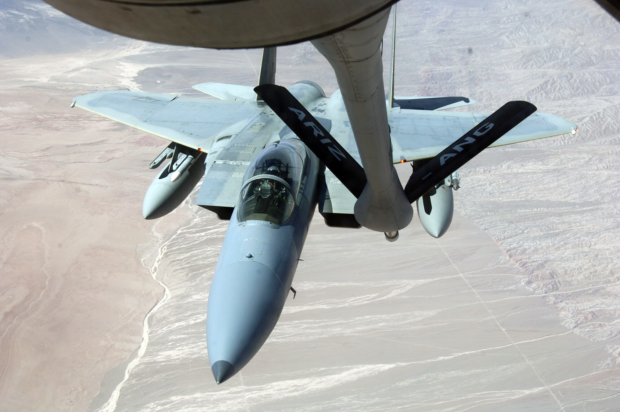 An F-15 Eagle with the 159th Fighter Wing approaches the boom of a KC-135 Stratotanker during a refueling mission Oct. 22 over Chile. The Chilean air force hosted military members from the United States, Brazil, Argentina and France during Exercise Salitre II, a multinational exercise focused on interoperability. (U.S. Air Force photo/Tech. Sgt. Eric Petosky) 