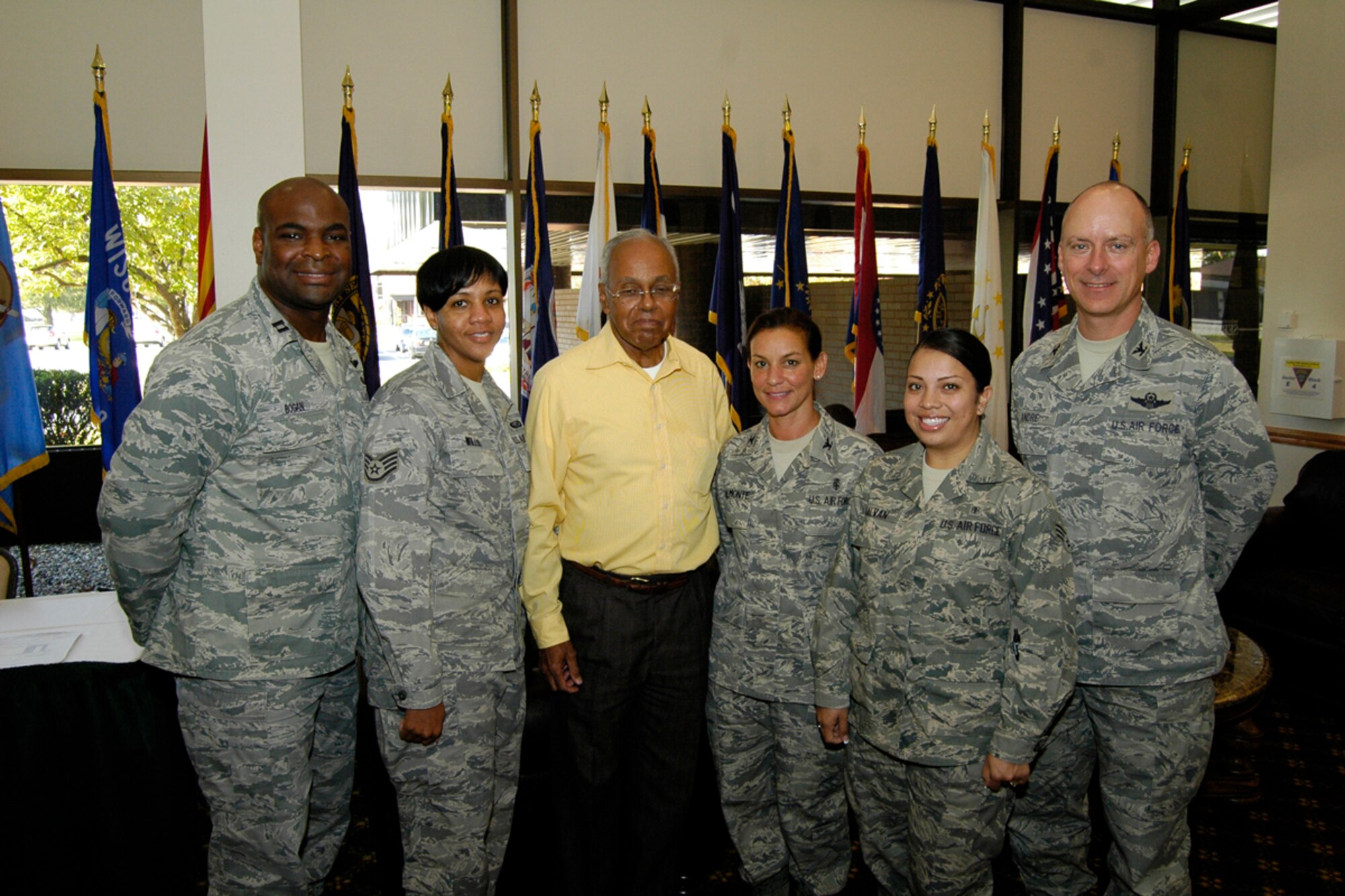 Members from Dobbins ARB interact with Major Gen. (ret) Joseph McNeil (center) who delivered a speech at the Human Resource Development Council onference for the 22nd Air Force held at McGuire AFB Nov. 21 and 22. General McNeil is one of the original leaders who established the HRDC program for the Air Force Reserves. Four members from Dobbins ARB attended the HRDC conference which is held yearly at varying locations. Also included in the picture is Col Jon Andre, 22nd Air Force vice commander, who oversaw the conference and delivered several speeches and critiques. (US Air Force photo/Senior Airman Shaun Shenk)