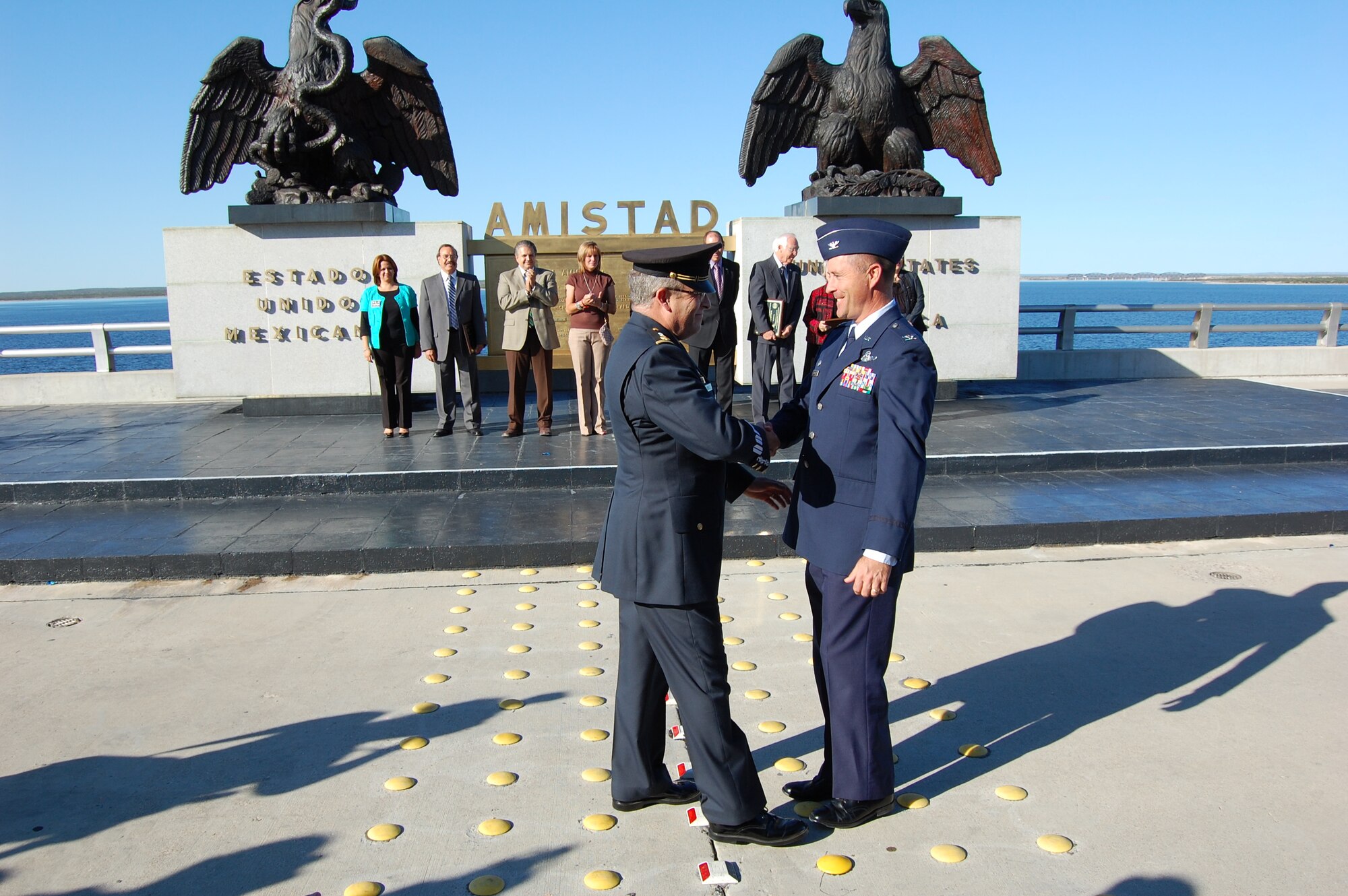 LAUGHLIN AIR FORCE BASE, Texas –– Col. Andrew Cernicky, 47th Mission Support Group commander, greets Maj. Gen. Francisco Gonzalez, commander, at the 49th anniversary of the Abrazo ceremony.  The Abrazo, which means to embrace or hug in greeting a person, is an annual tradition which symbolizes the friendship of the Republic of Mexico and the United States of America. (U.S. Air Force photo by George McKnight)  