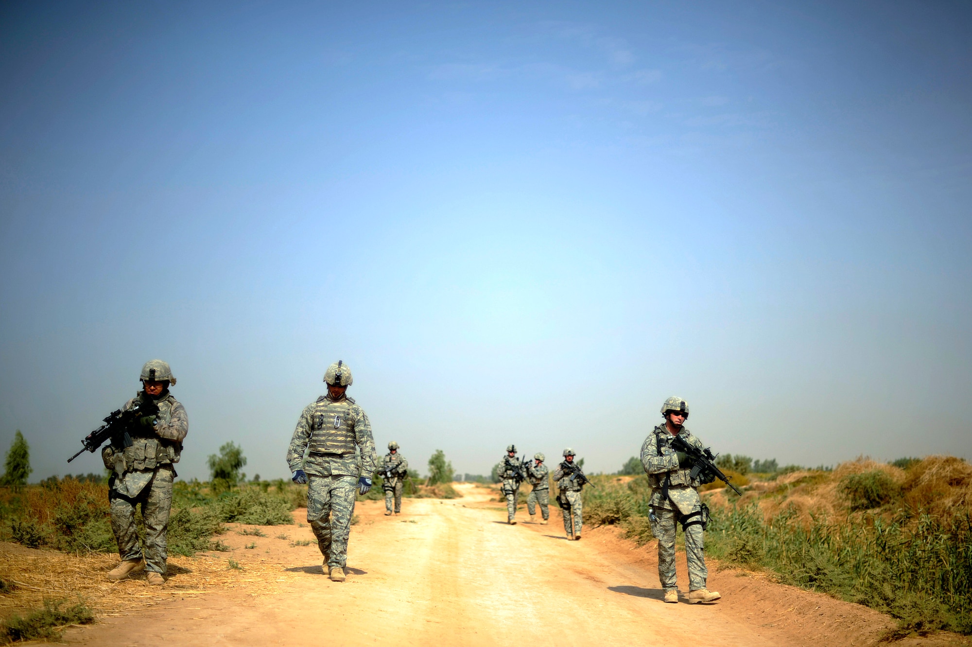 Airmen from the 532nd Expeditionary Security Forces Squadron perform a force protection patrol Oct. 17, 2009, outside Joint Base Balad, Iraq. The 532nd ESFS patrols provide a security presence intended to deter anyone who would do harm to the people who live and work at the base. (U.S. Air Force photo/Staff Sgt. Michael B. Keller) 