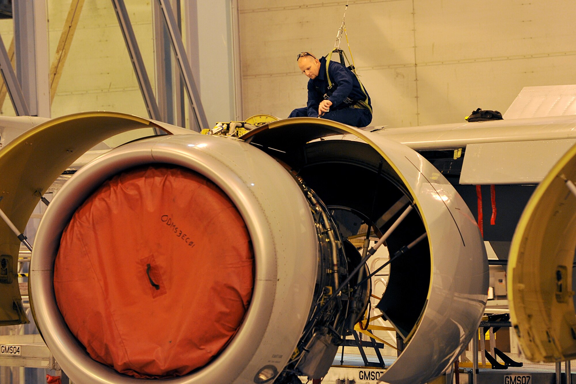 OFFUTT AIR FORCE BASE, Neb., --  Shane Conaway,  a jet engine mechanic with the 55th Maintenance Squadron isochronal phased inspection dock, inspects the right wing of an RC-135 aircraft during a isochronal inspection at the Bennie Davis Maintenance Facility here Oct.23. In the isochronal phase inspection dock, approximately 40 people are responsible for maintaining Offutt's 135's and ensuring they are mission ready. The performance of the 55th MXS Isochronal inspection dock during a recent inspection helped the 55th Wing earn the Meritorius Unit Award. U.S. Air Force Photo by Charles Haymond
