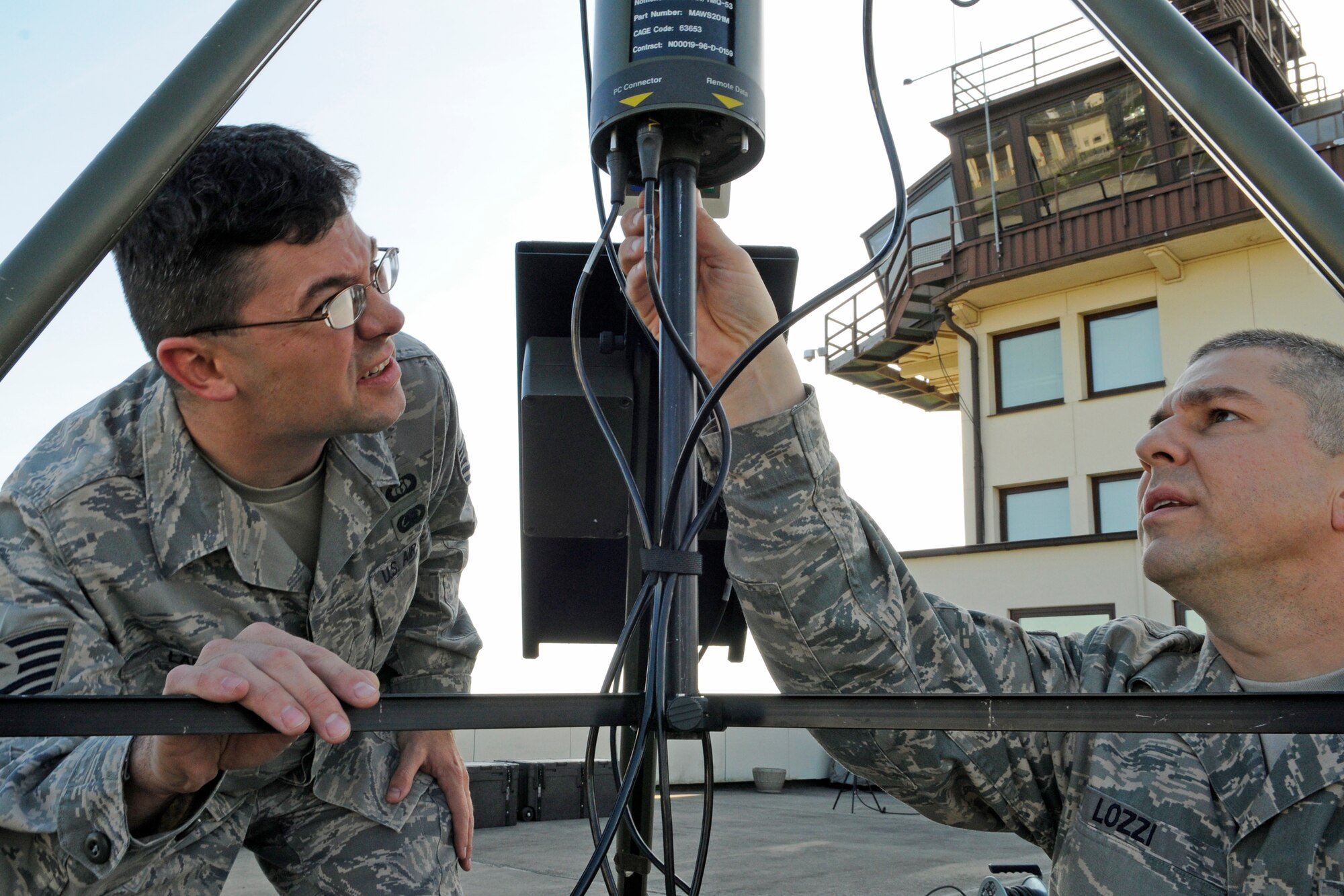 SPANGDAHLEM AIR BASE, Germany – Tech. Sgts. Warren Labare and Christopher Lozzi, 52nd Operations Support Squadron mission weather forecasters, set up and test a deployable, automated weather-observing system to ensure it meets standards and technical-order guidelines during a Standards Evaluation Program for Weather Operations and Air Traffic System Evaluation Program inspection conducted by U.S. Air Forces in Europe inspectors Oct. 20. “The 52nd OSS and the (52nd Fighter Wing) came together and demonstrated to the inspectors of the air traffic system and weather operations our ability to provide safe and efficient air traffic service to the 52nd FW and Air Mobility Command assets, alike,” said Capt. Ryan Guess, 52nd OSS airfield operations flight commander. “Spangdahlem Air Base garnered an ‘Excellent’ rating – determined after evaluating more than 700 checklist items. This inspection looked at specific functional areas of the 52nd OSS, 52nd Communications Squadron, 52nd Civil Engineer Squadron and wing safety. I would like to thank each of them for the dedication to excellence, which ensured our evaluation’s success. Finally, to all of the airfield drivers who operated safely not only during the inspection, but also for previous months and years, thank you for helping us show inspectors our commitment to safe airfield driving habits.” (U.S. Air Force photo/Senior Airman Benjamin Wilson)