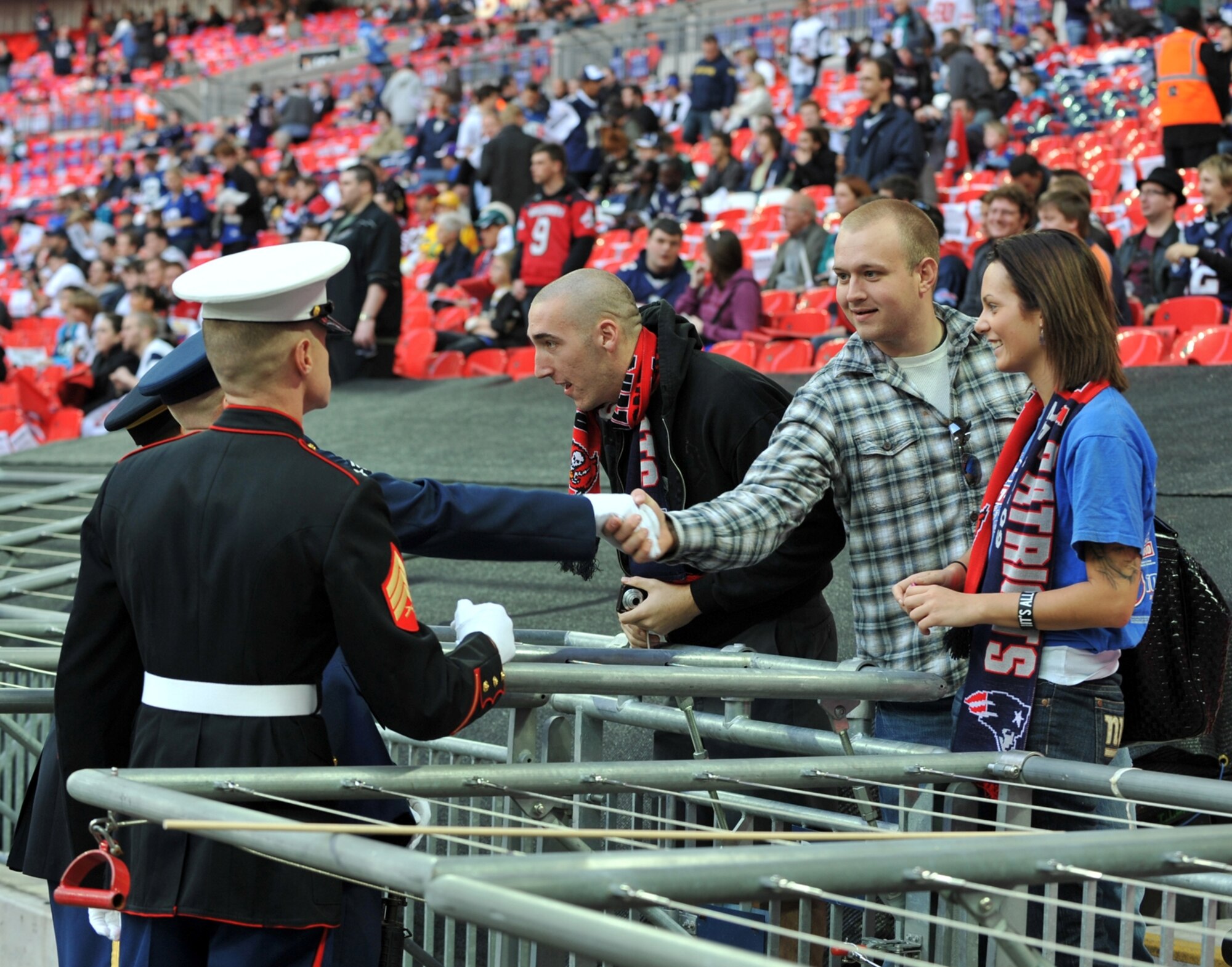Just prior to the game JAC Joint Honor Guard greet some of their JAC team members before the NFL game at Wembley Stadium.   (Photo by Air Force Staff Sgt. Javier Cruz)