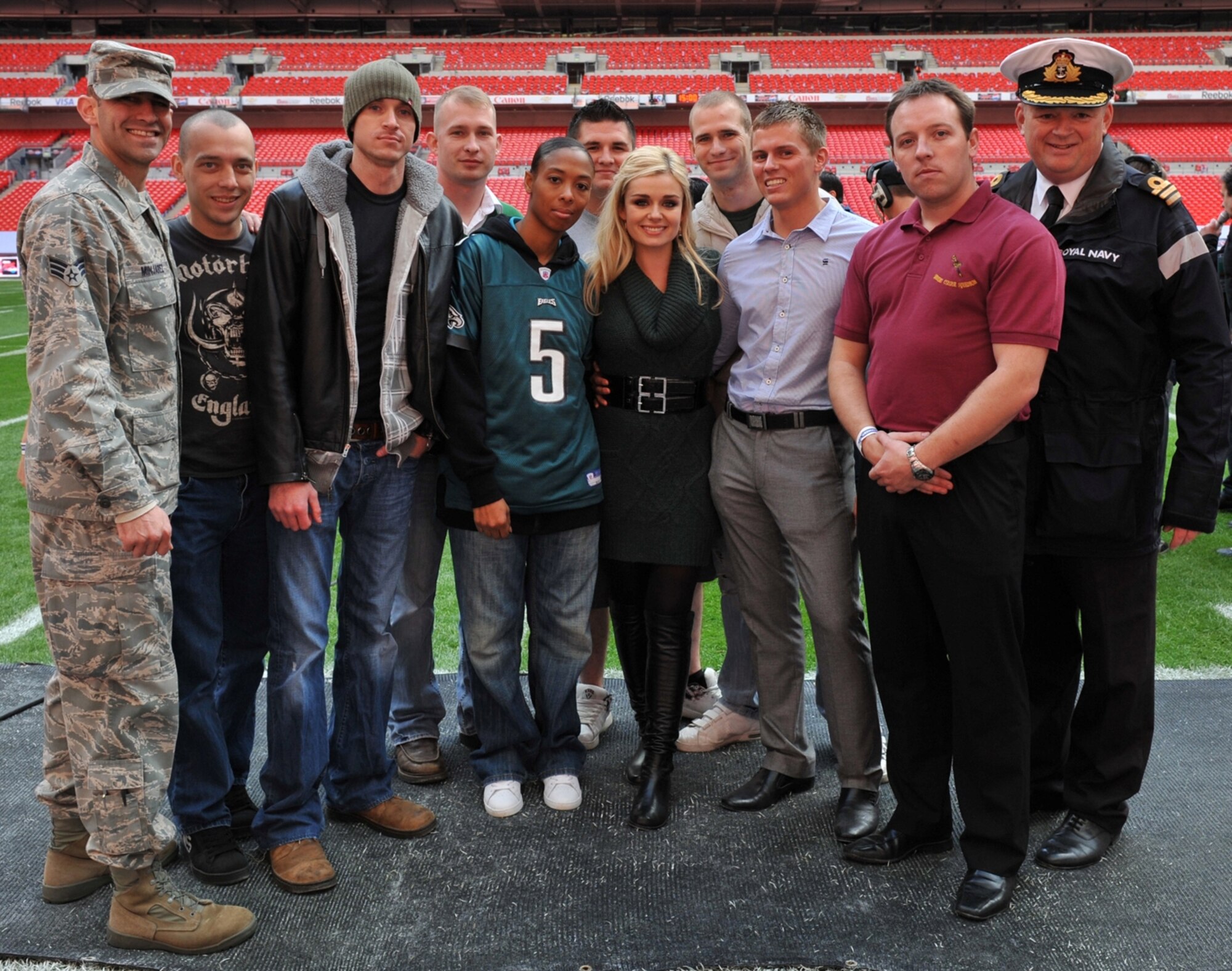 JAC Joint Honor Guard and British Joint Color Guard pose before the NFL game at Wembley Stadium with Welsh music star Katherine Jenkins.   (Photo by Air Force Staff Sgt. Javier Cruz)