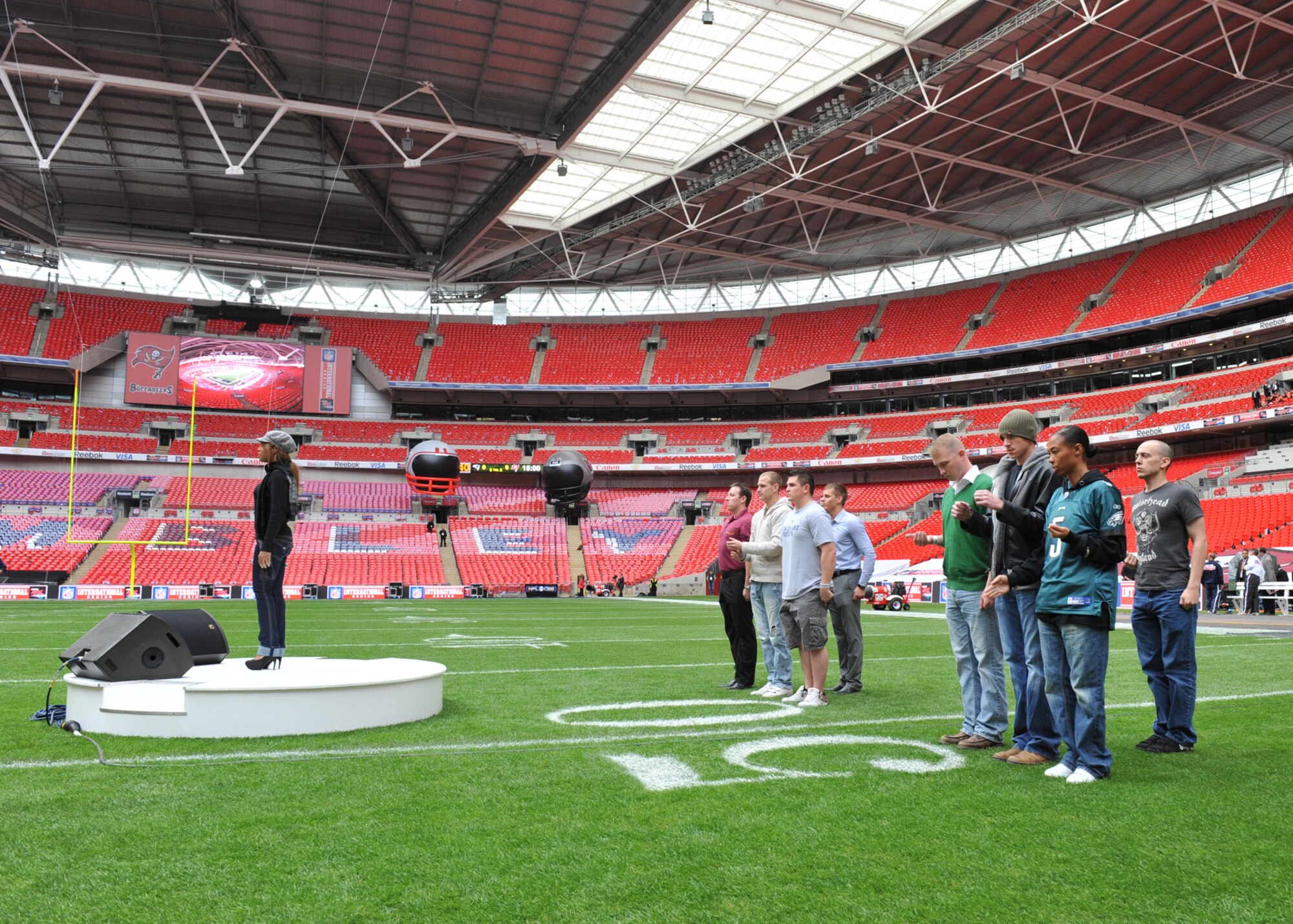 JAC Joint Honor Guard and British Joint Color Guard practice before the NFL game at Wembley Stadium with pop star Toni Braxton.   (Photo by Air Force Staff Sgt. Javier Cruz)