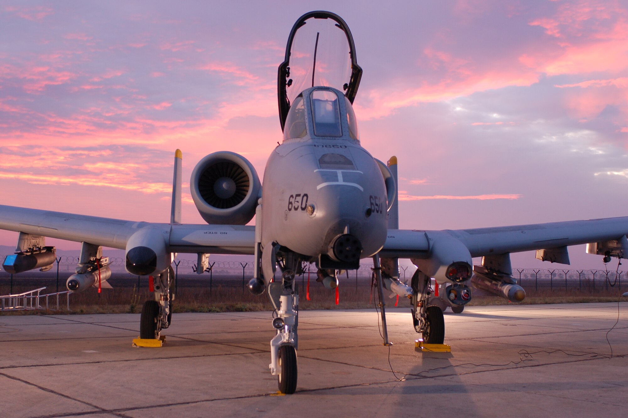 CAMPIA-TURZII, Romania -- An A-10 Thunderbolt II assigned to the 81st Fighter Squadron stands ready on the flightline here Oct. 22 for an early-morning take-off. The 81st FS conducted more than 100 sorties during Dacian Thunder, a month-long combined exercise with the Romanian air force focused on enhancing their ability to execute combat search and rescue, air-to-air and air-to-ground, and weapons delivery missions. (U.S. Air Force photo/2nd Lt. Kathleen Polesnak)
