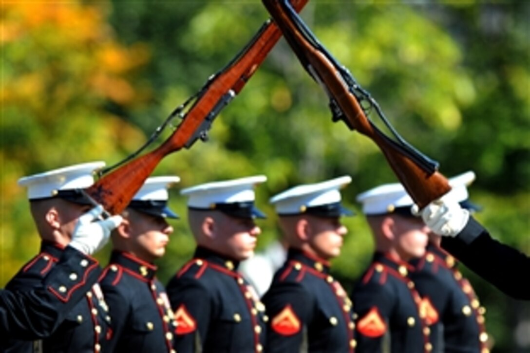 The U.S. Marine Corps Silent Drill Platoon perform during a ceremony honoring World War II veterans from North Carolina on the National Mall in Washington, D.C., Oct. 20, 2009.