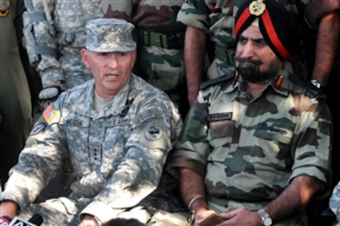 U.S. Army Lt. Gen. Benjamin R. Mixon, left, the commander of U.S. Army Pacific, and Indian Army Lt. Gen. Amarjeet Singh Sekhon, the director general of military operations for the Indian army, answer questions during a press conference during Yudh Abhyas, a bilaterial U.S.-Indian exercise on Camp Bundela, India, Oct. 26, 2009.