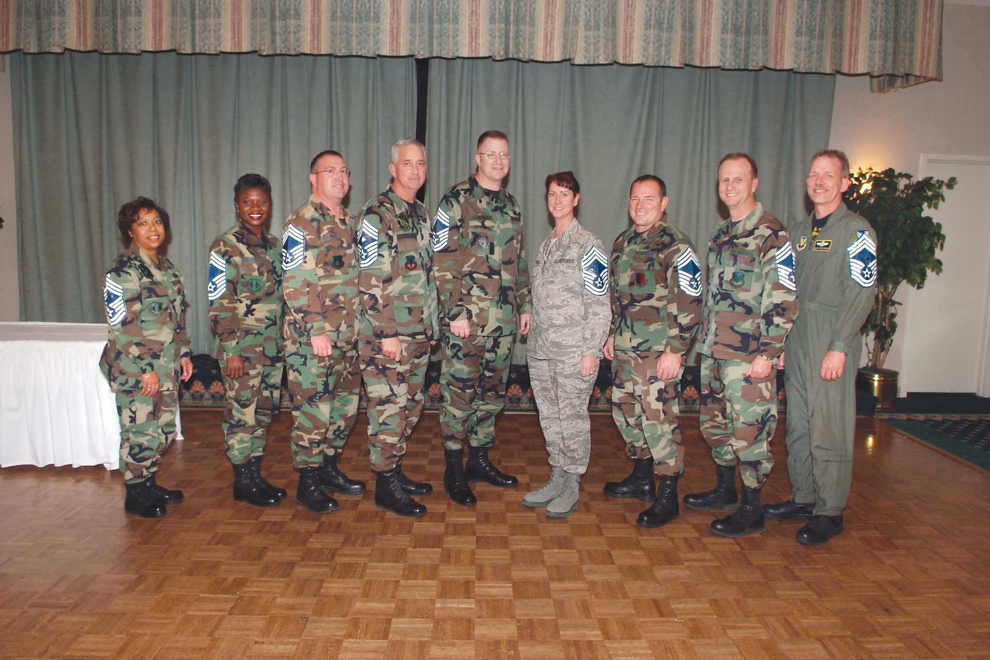 Twelve from Robins Air Force Base were included in the Chief select list. Senior Master Sergeants Sakenna Dixon, Carol Humphrey, Joseph Riley, Robert Hipple, John Campbell, Andrea Gates, Anthony Pope, Micky Wall, and Steven Helms pose for a photo at a reception for them Nov. 16.( Not pictured are Sr. MSgts. Michael Rosser, Roxann Santos, and Kerry Taylor) U.S. Air Force photo by Gary Cutrell