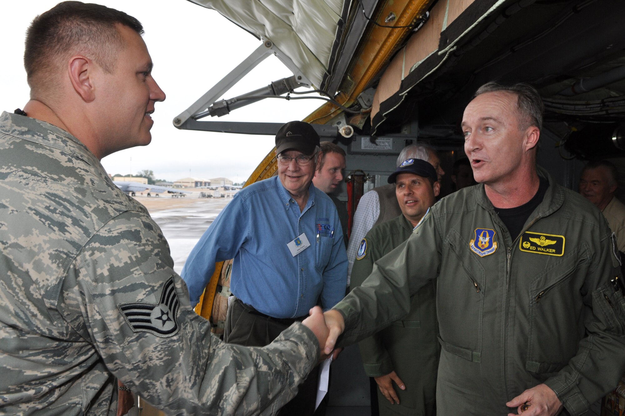 Colonel Edmund Walker, commander, 917th Wing, thanks Staff Sgt. Clayton Potter, hydraulic specialist, 931st Aircraft Maintenance Squadron, McConnell, Air Force Base, Kan., for all of his hard work at Barksdale Air Force Base, La., October 22, 2009. More than twenty-six influential civic leaders from the Shreveport/Bossier City area of Louisiana gained first-hand knowledge of operations of the Air Force during a two-day “Civic Leader Tour” flight from Barksdale Air Force Base, La., to Eglin Air Force Base, Fla., on October 21-22, 2009. The leaders received several mission briefings and viewed a static display of the MC-130 Combat Talon I as well as touring several facilities at Eglin AFB and Duke Field, Fla. (U.S. Air Force photo/Tech. Sgt. Jeff Walston)