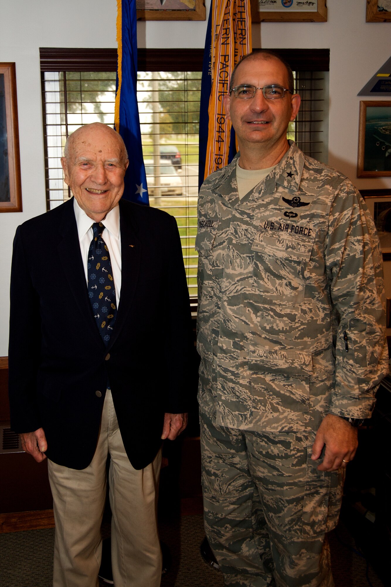 KEESLER AIR FORCE BASE, Miss. --  Rear Adm (Ret).  J. Lloyd Abbot Jr., (Left) stands with Brig. Gen. James Muscatell Jr.,(right) commander of the 403rd Wing during a recent visit. 

Admiral Abbot toured the Lockeed Martin C-130J simulator and toured one of  the 403rd Wing's 18 J-model aircraft. 

Admiral Abbot served from 1943 to 1974. Abbot was the Commanding Officer, U.S. Naval Support Force, Antarctica, February 1967 to June 1969 and has an ice shelf named in his honor.The Abbot ice shelf is 250 mile long and 40 mi wide and borders Eights Coast from Cape Waite to Phrogner Point. (U.S. Air Force Photo by Lt. Col. Chad  E. Gibson)