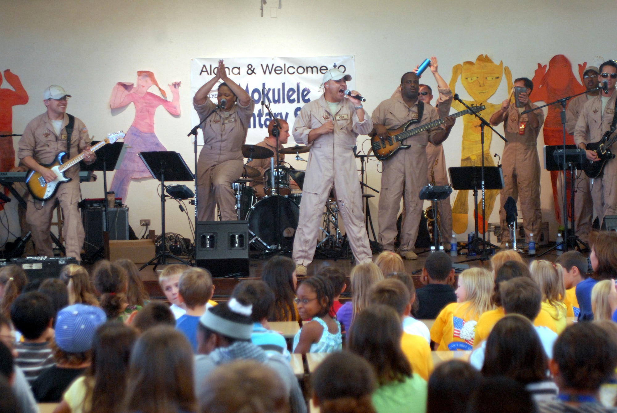HICKAM AIR FORCE BASE, Hawaii -- The U.S. Air Force Band of the Pacific perform for students at Mokulele Elementary School here Oct. 28. Mokulele, one of two elementary schools on Hickam, was one of six schools the band performed for in support of Red Ribbon Week. Red Ribbon Week focuses on living and maintaining a drug free lifestyle. (U.S. Air Force photo/Senior Airman Gustavo Gonzalez)