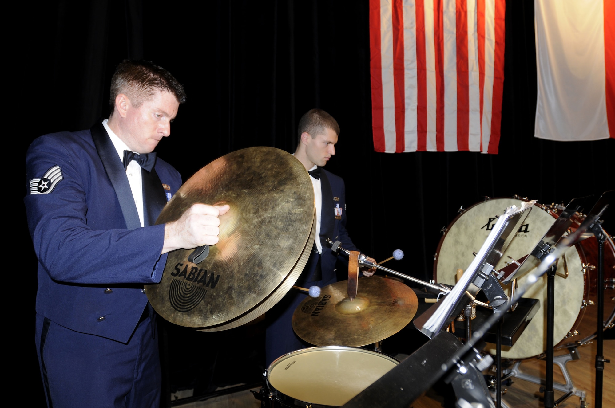 BYDGOSZCZ, Poland – Staff Sgt Robert Browning (left) on the cymbals and Senior Airman Justin Trimble (right) on the suspended cymbal perform during the U.S. Air Forces in Europe Band’s performance that the Cultural Center of the Pomeranian Military Ward here Oct. 25. The band is performing six concerts in six days, Oct. 20-25, in support of USAFE's international relations program in partnership with the U.S. State Department.  More than 2,500 people attended this concert series which commemorates 90 years of diplomatic relations between the United States and Poland.  (U.S. Air Force photo/Master Sgt. Kelley J. Stewart)