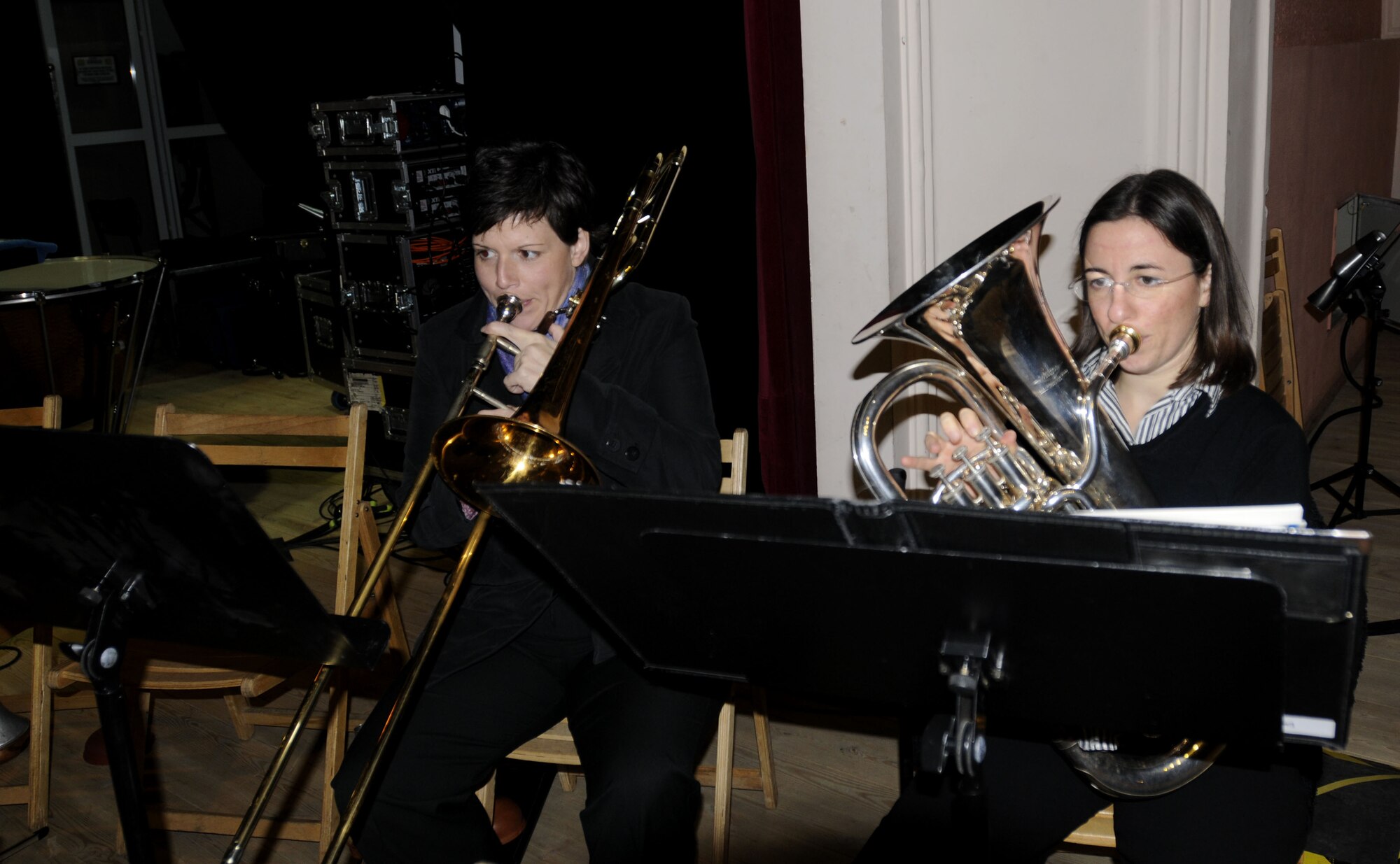 BYDGOSZCZ, Poland – Staff Sgts. Saundra Sininger (left) and Meredith Healy (right) practice prior to sound check at the Cultural Center of the Pomeranian Military Ward here Oct. 25.  The U.S. Air Forces in Europe Band is performing six concerts in six days, Oct. 20-25, in support of USAFE's international relations program in partnership with the U.S. State Department.  More than 2,500 people attended this concert series which commemorates 90 years of diplomatic relations between the United States and Poland.  (U.S. Air Force photo/Master Sgt. Kelley J. Stewart)