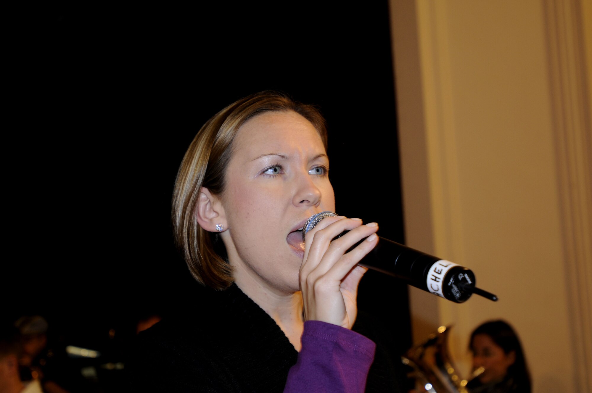 BYDGOSZCZ, Poland – Senior Airman Rachel Trimble performs part of “Cheek to Cheek” during a sound check at the Cultural Center of the Pomeranian Military Ward here Oct. 25.  The U.S. Air Forces in Europe Band is performing six concerts in six days, Oct. 20-25, in support of USAFE's international relations program in partnership with the U.S. State Department.  More than 2,500 people attended this concert series which commemorates 90 years of diplomatic relations between the United States and Poland.  (U.S. Air Force photo/Master Sgt. Kelley J. Stewart)