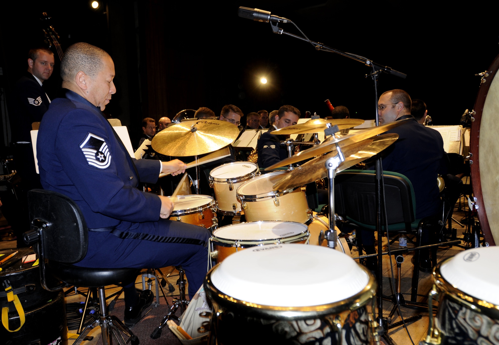 KUTNO, Poland – Master Sgt. Clarence Carpenter performs a drum solo during “Sing, Sing, Sing” that gets the crowd clapping during the U.S. Air Forces in Europe Band’s concert at the Kutno Cultural Center Oct. 24.  The band is performing six concerts in six days, Oct. 20-25, in support of USAFE's international relations program in partnership with the U.S. State Department.  Four hundred people from Kutno attended this concert which commemorates 90 years of diplomatic relations between the United States and Poland.  (U.S. Air Force photo/Master Sgt. Kelley J. Stewart)