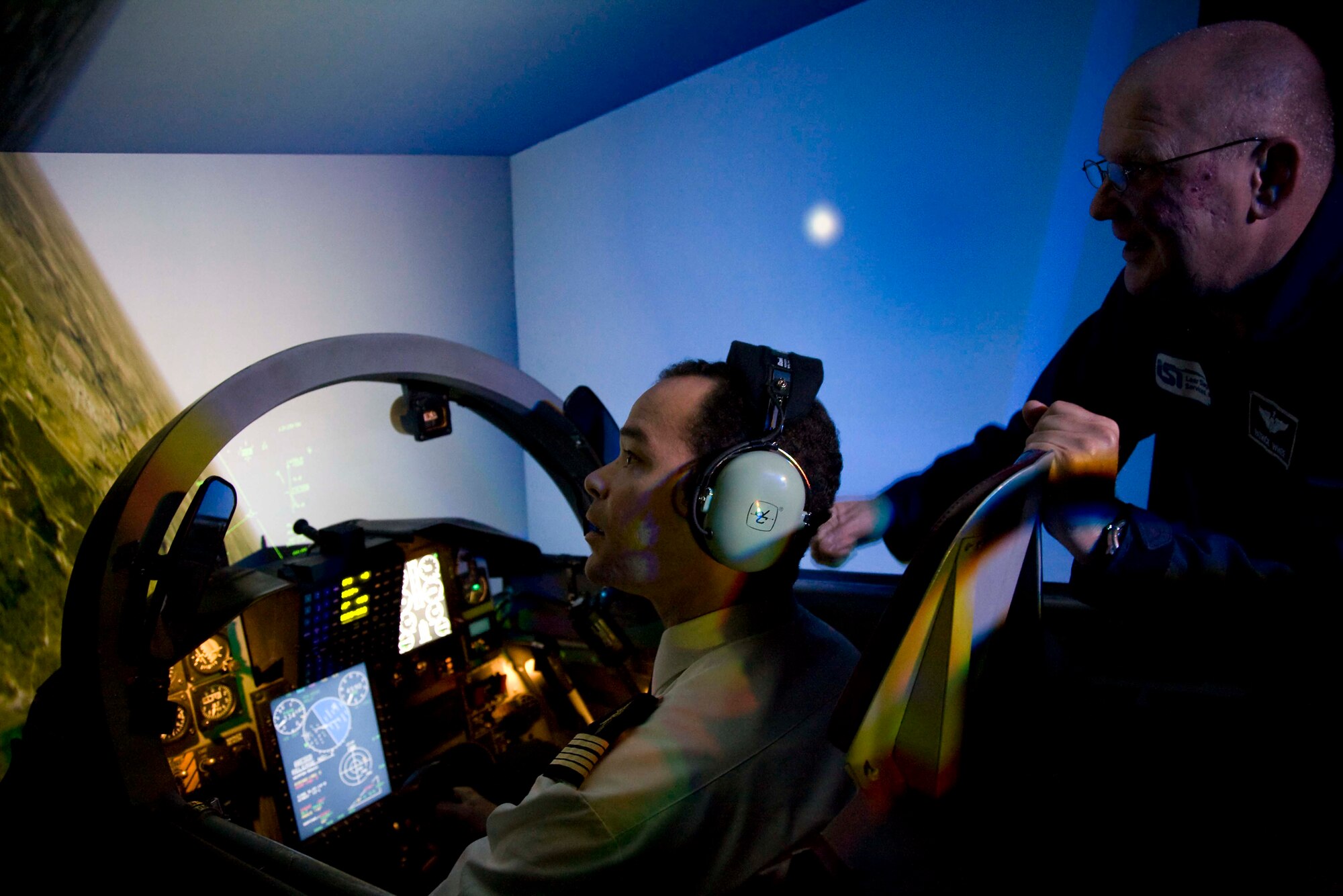 Patrick White of Lear Siegler, Inc., instructs French Col. Jean-Marc Blanckaert, commanding officer of the French air force's Advanced Jet Training School, Oct. 19 during a simulated range sortie in the T-38C simulator. Colonel Blanckaert and two others from France, Lt. Col. Franck Le Roux and Maj. Jerome Armand, visited the 80th Flying Training Wing's Euro-NATO Joint Jet Pilot Training Program to learn more about the wing's training mission and leadership concept. (U.S. Air Force photo/Lt. Col. Ternell Washington)