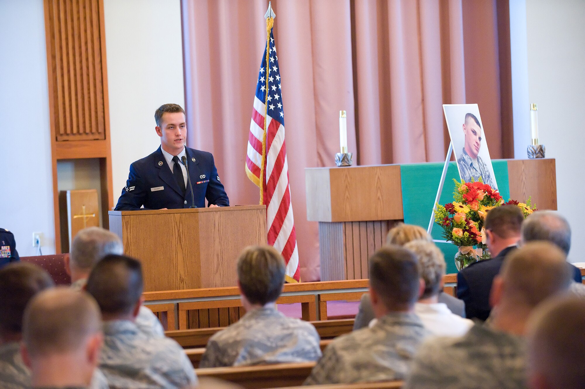 Airman 1st Class Jonathan Kilduff speaks about the loss of his friend, Airman 1st Class Darrick A. Wright, during a memorial service Oct. 22. (U.S. Air Force photo/Jason Minto)